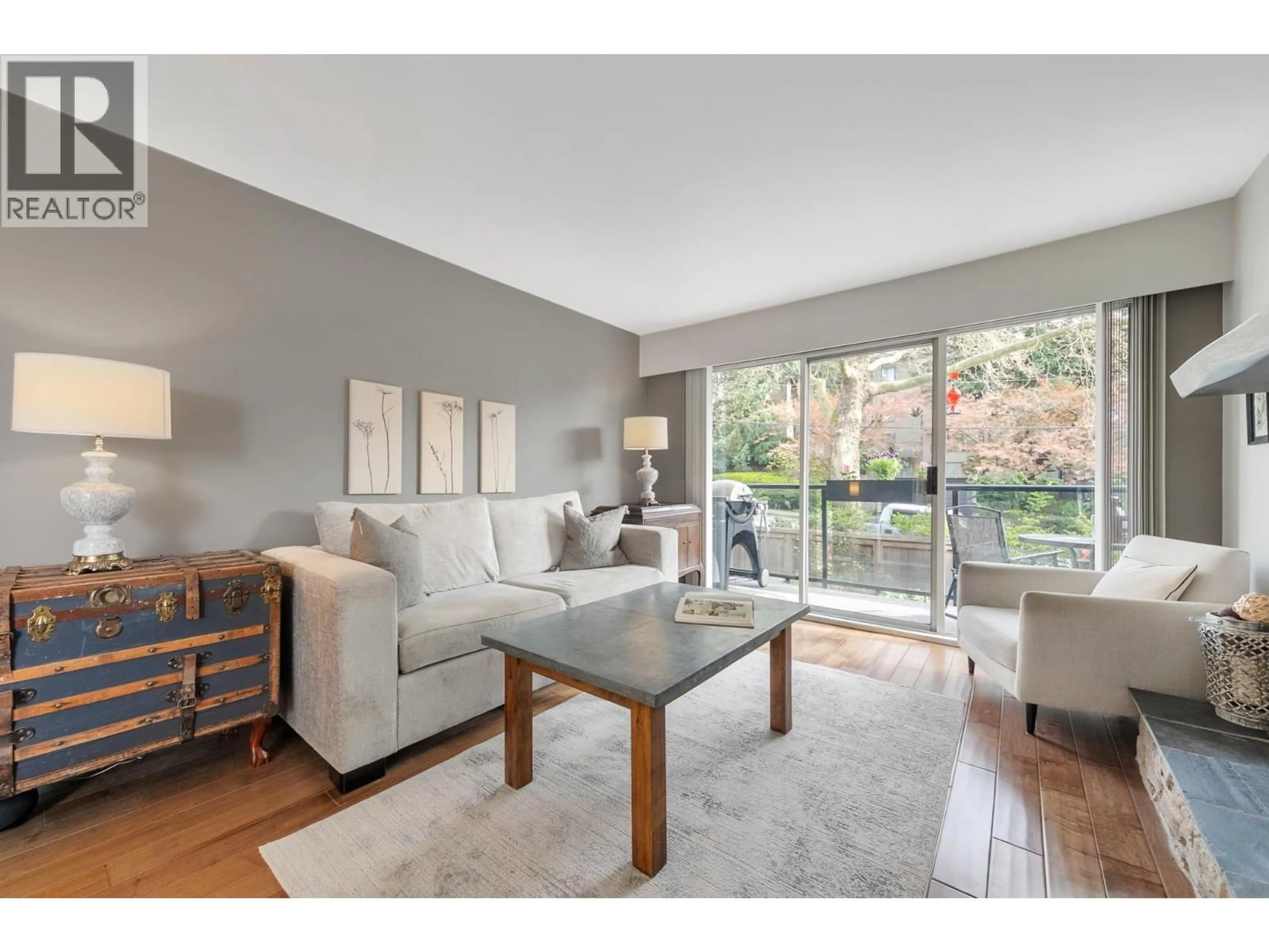 Living room with furniture, wood/laminate floor for 213 - 230 MOWAT STREET, New Westminster British Columbia V3M4B2