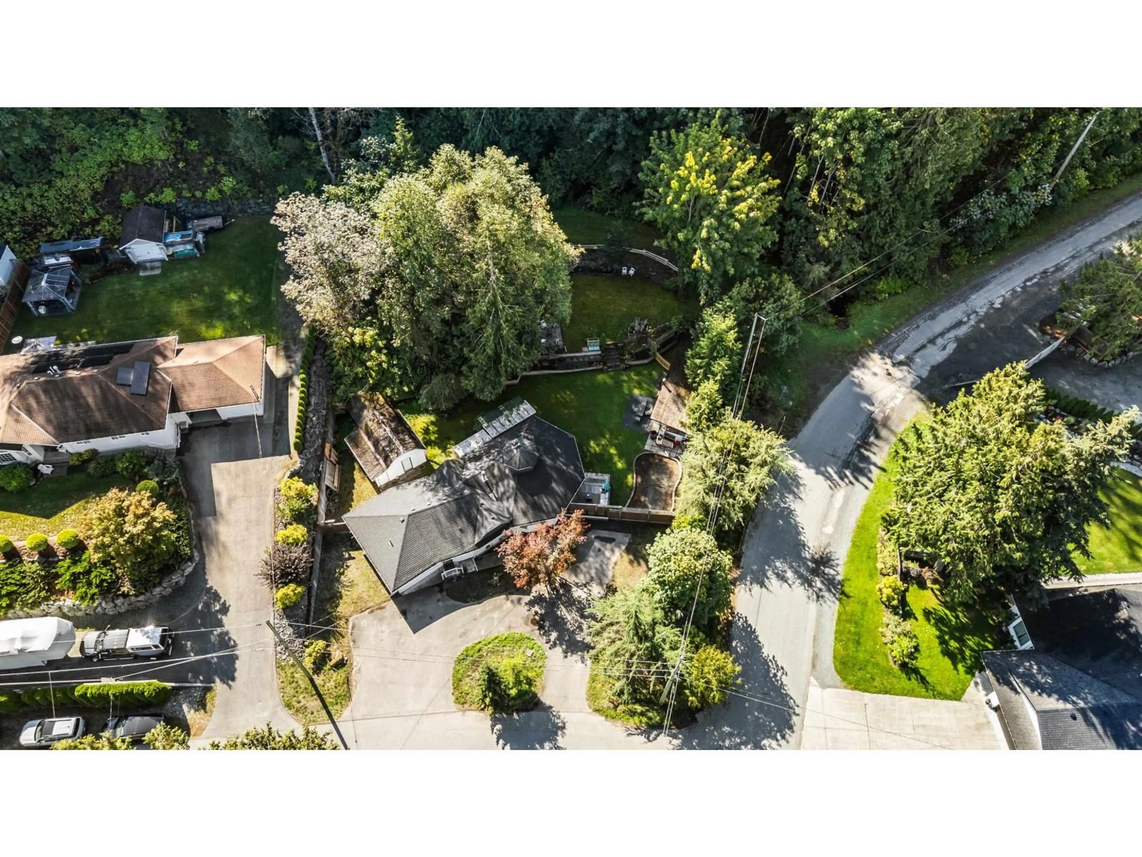 A pic from outside/outdoor area/front of a property/back of a property/a pic from drone, unknown for 45942 SLEEPY HOLLOW ROAD, Cultus Lake British Columbia V2R5A8