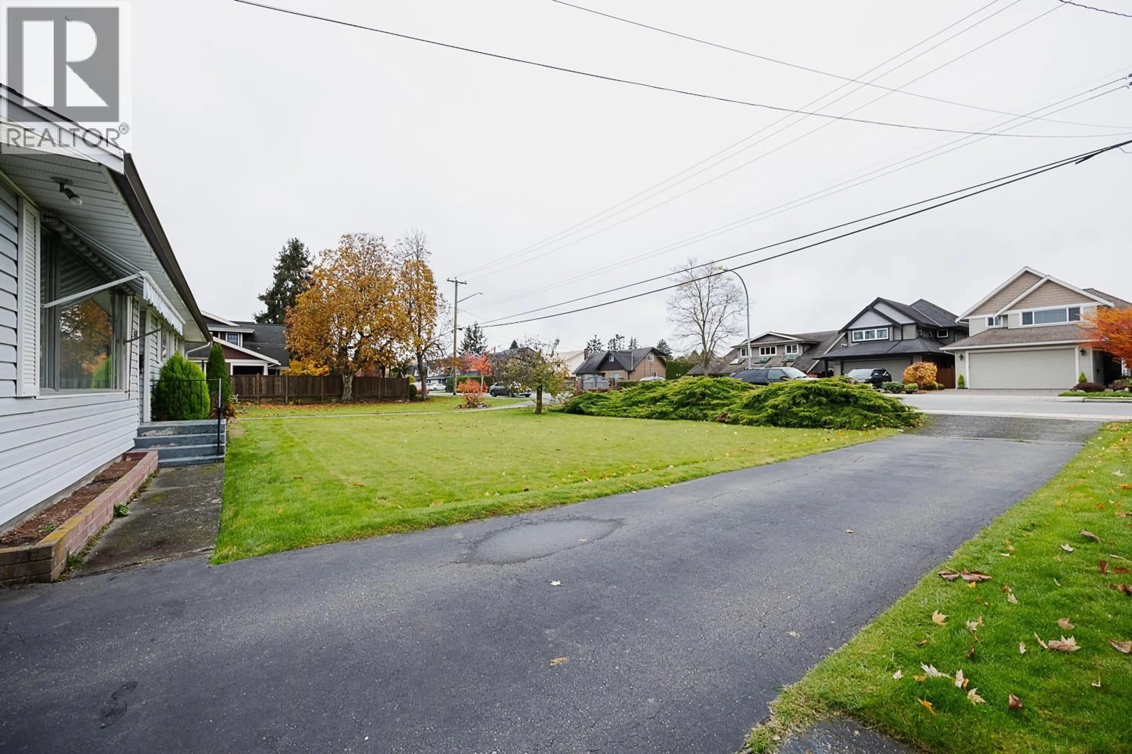A pic from outside/outdoor area/front of a property/back of a property/a pic from drone, street for 4638 53 STREET, Delta British Columbia V4K2Z1
