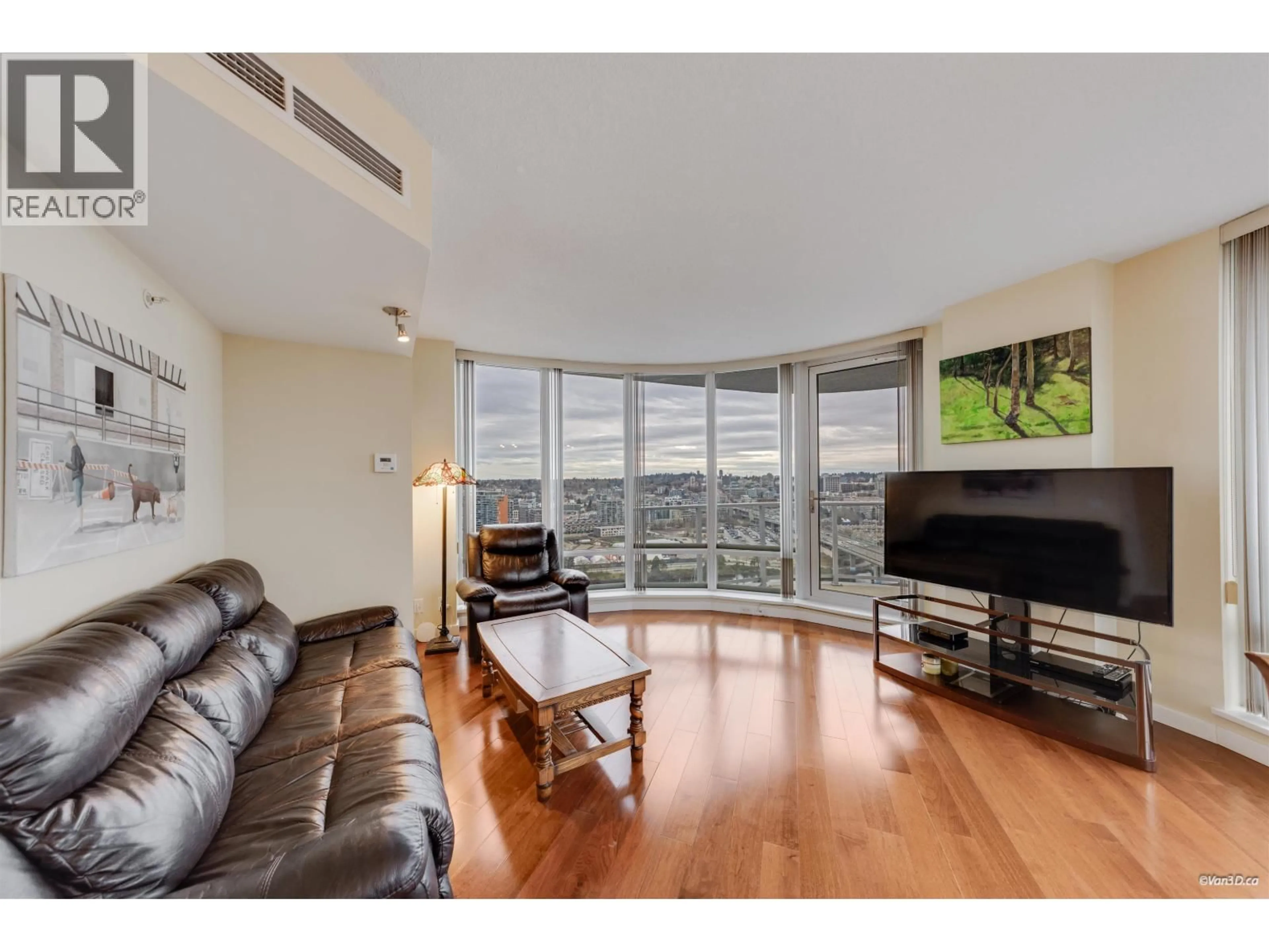 Living room with furniture, wood/laminate floor for 2705 - 918 COOPERAGE WAY, Vancouver British Columbia V6B0A7