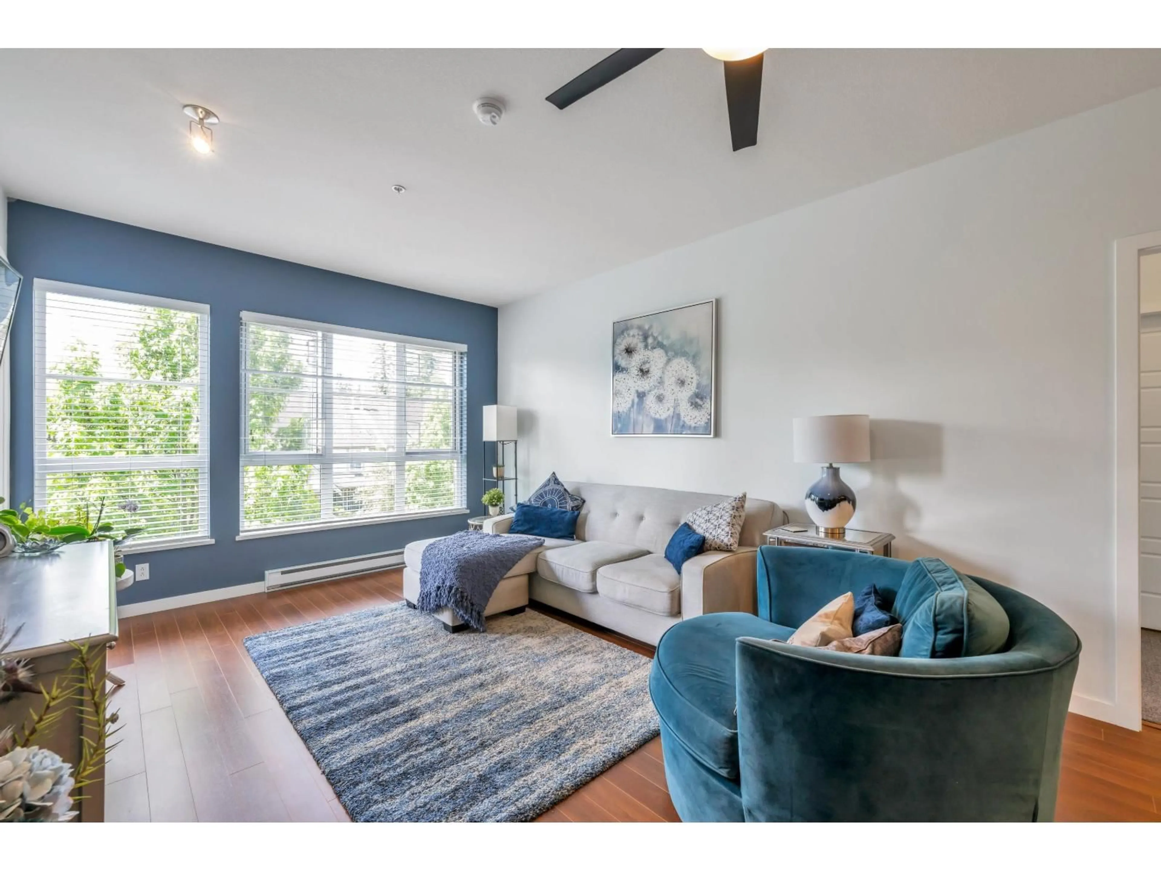 Living room with furniture, unknown for 309 - 23215 BILLY BROWN ROAD, Langley British Columbia V1M0B7