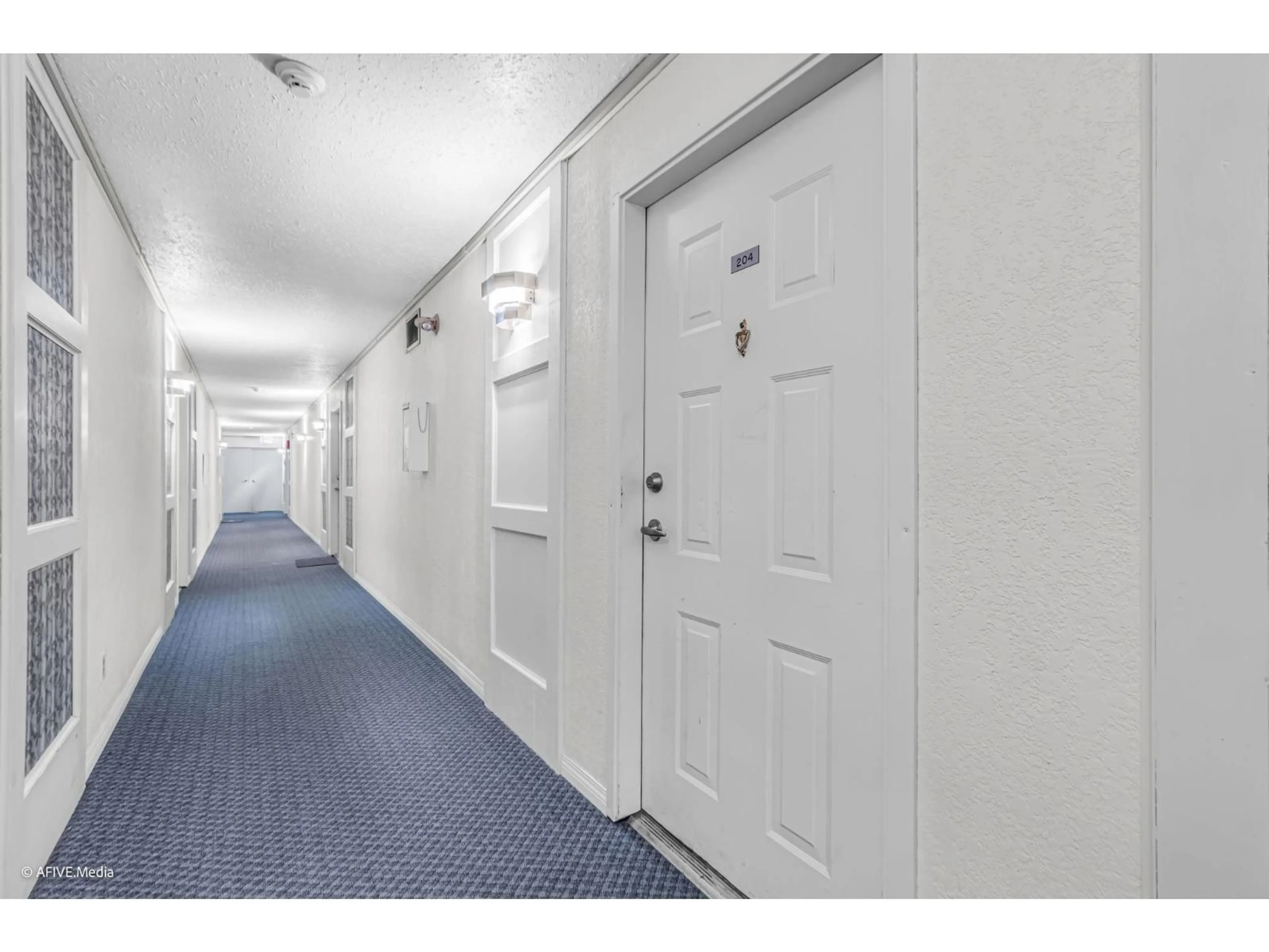 Indoor foyer for 204 - 32950 AMICUS PLACE, Abbotsford British Columbia V2S6G9