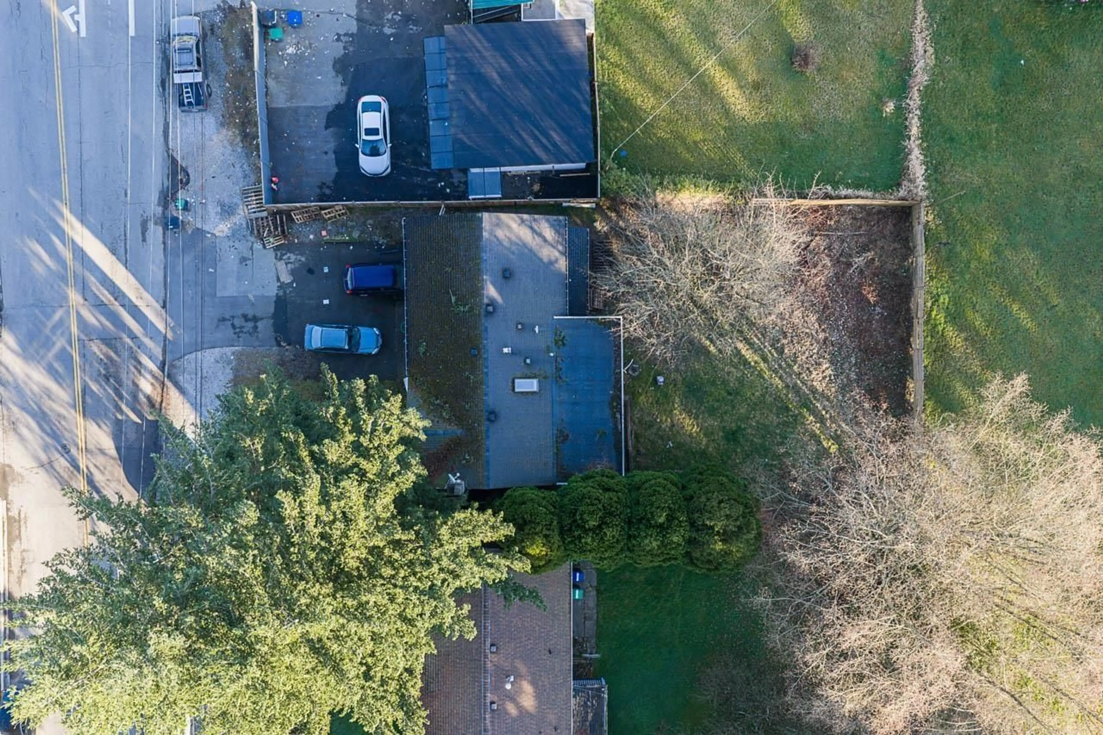 A pic from outside/outdoor area/front of a property/back of a property/a pic from drone, street for 12788 102 AVENUE, Surrey British Columbia V3V3E5