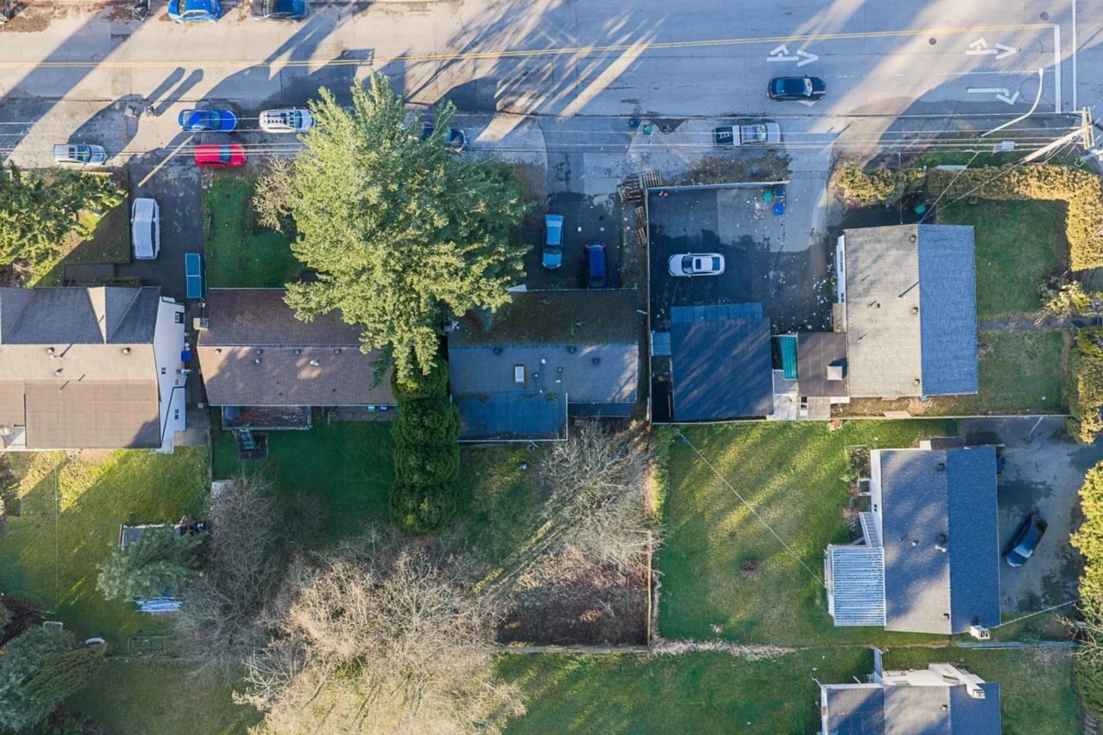 A pic from outside/outdoor area/front of a property/back of a property/a pic from drone, street for 12788 102 AVENUE, Surrey British Columbia V3V3E5