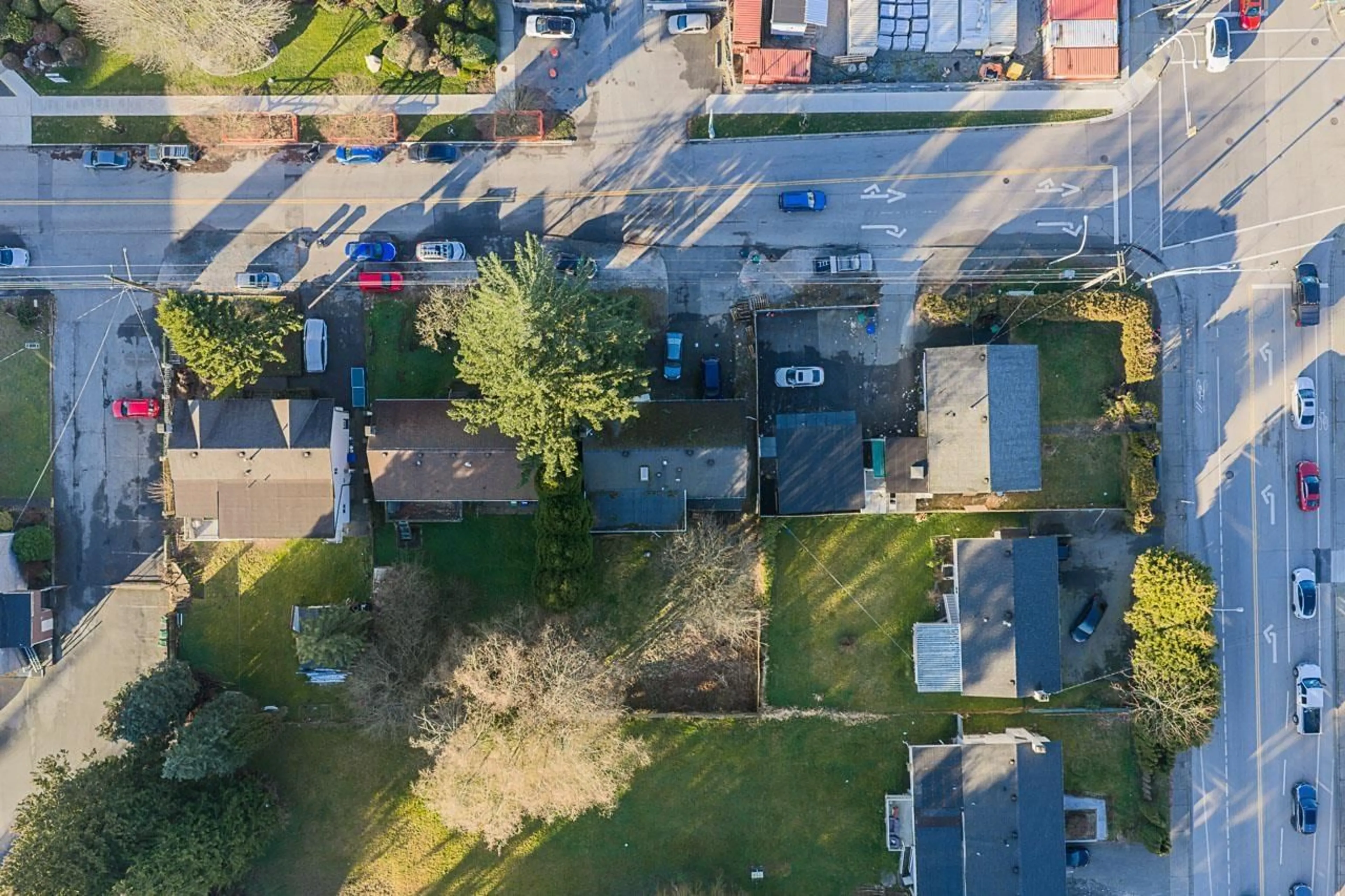 A pic from outside/outdoor area/front of a property/back of a property/a pic from drone, street for 12788 102 AVENUE, Surrey British Columbia V3V3E5