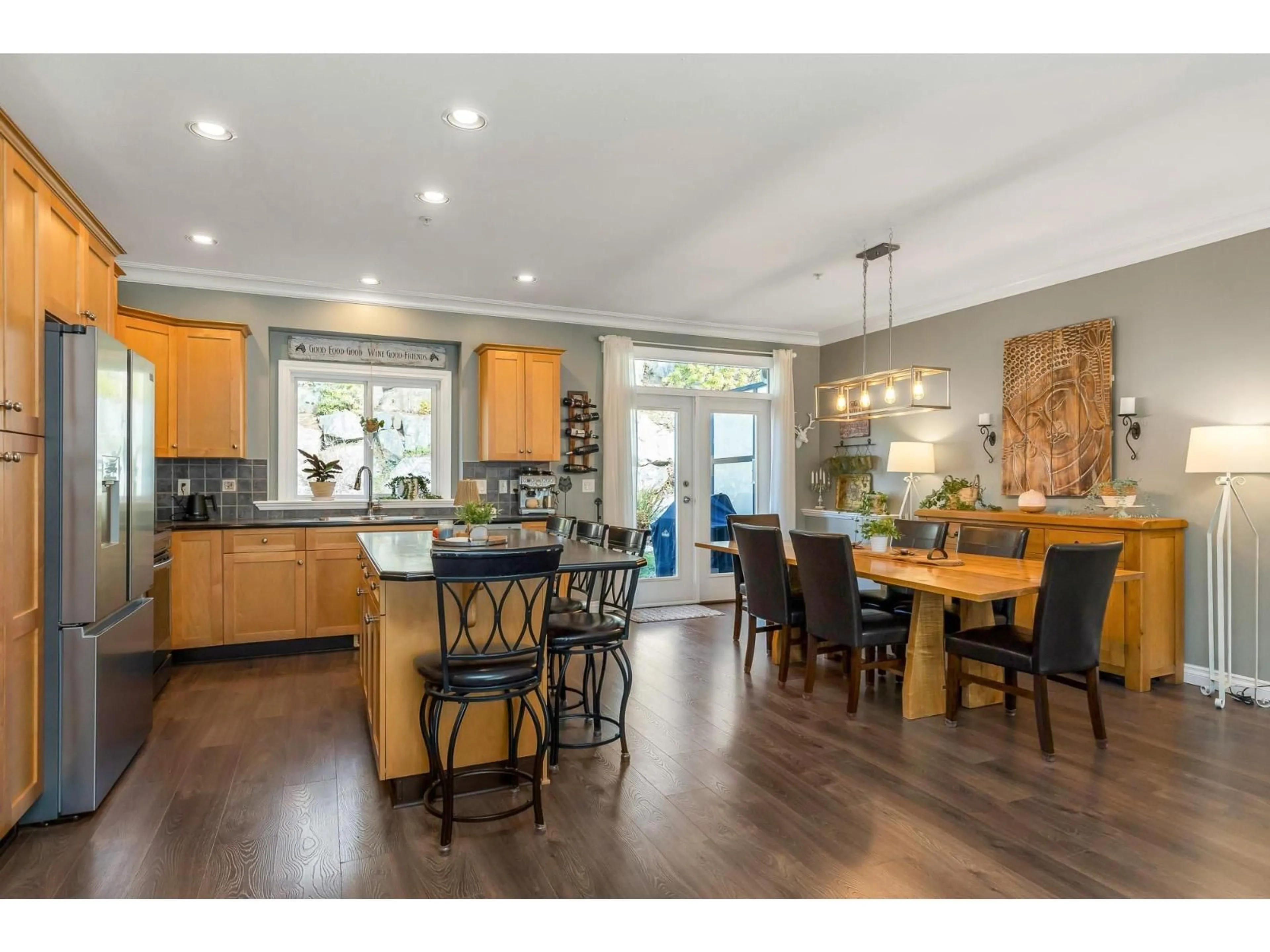 Open concept kitchen, wood/laminate floor for 66 - 36260 MCKEE ROAD, Abbotsford British Columbia V3G0A9