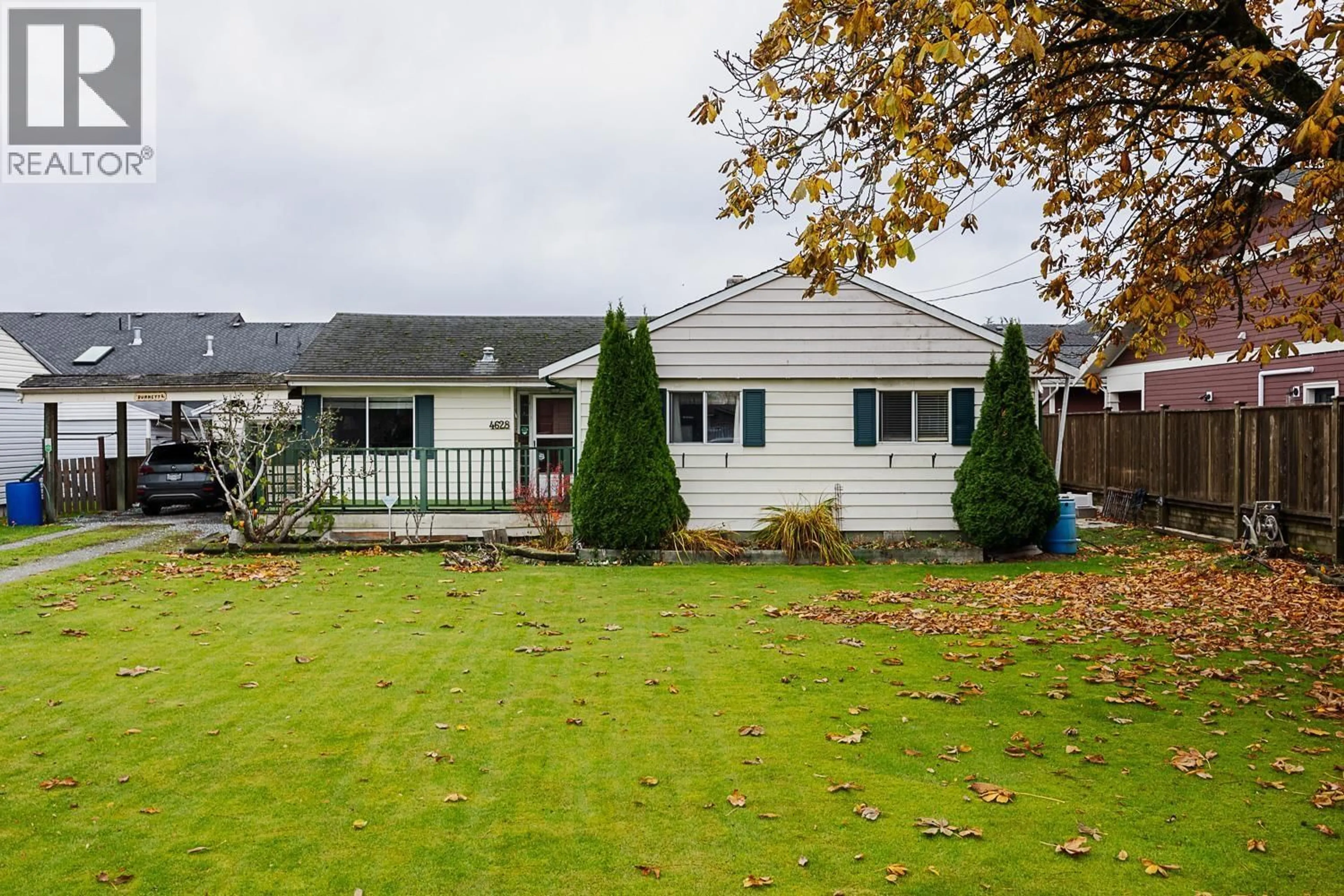 A pic from outside/outdoor area/front of a property/back of a property/a pic from drone, street for 4628 53 STREET, Delta British Columbia V4K2Z1