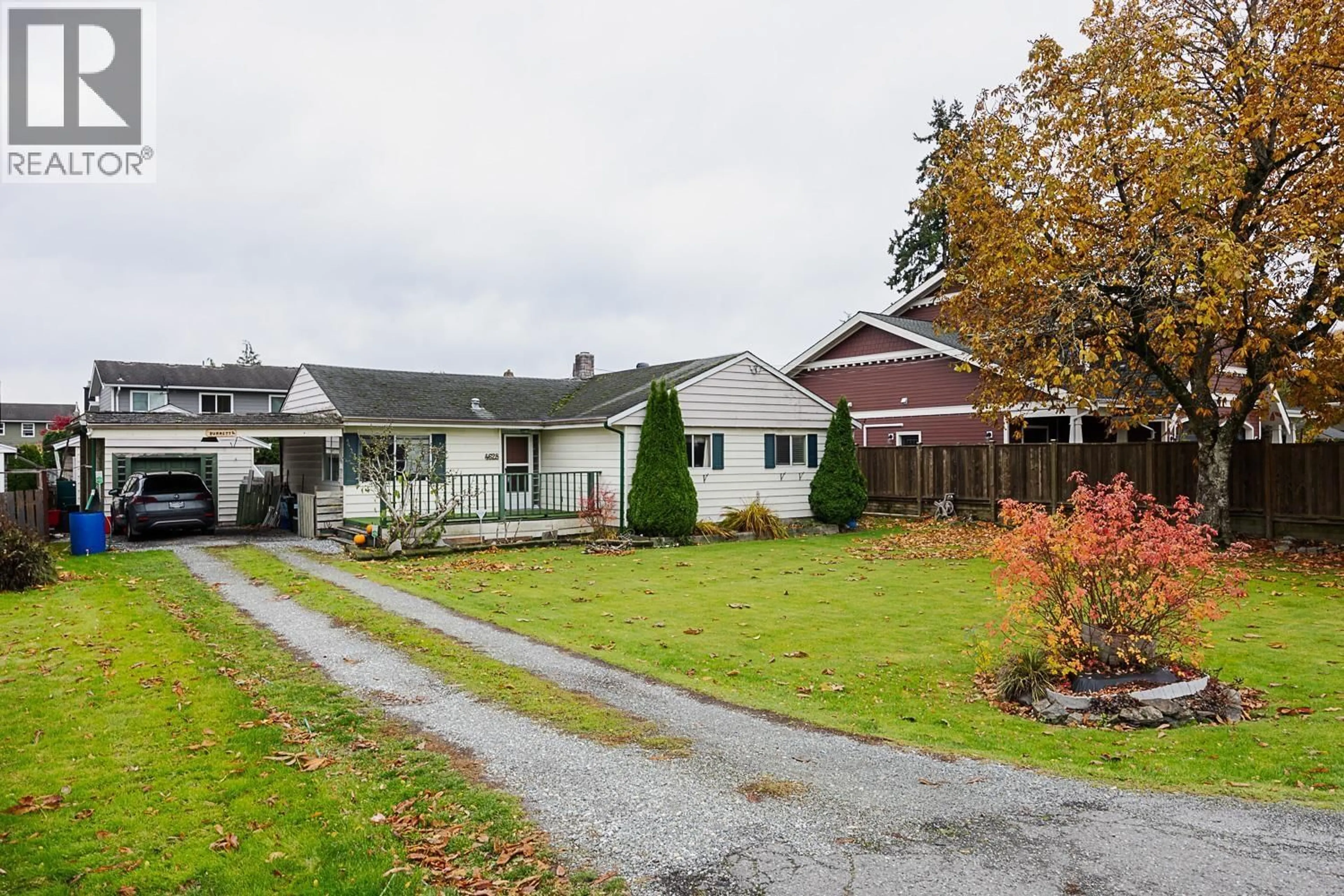 A pic from outside/outdoor area/front of a property/back of a property/a pic from drone, street for 4628 53 STREET, Delta British Columbia V4K2Z1