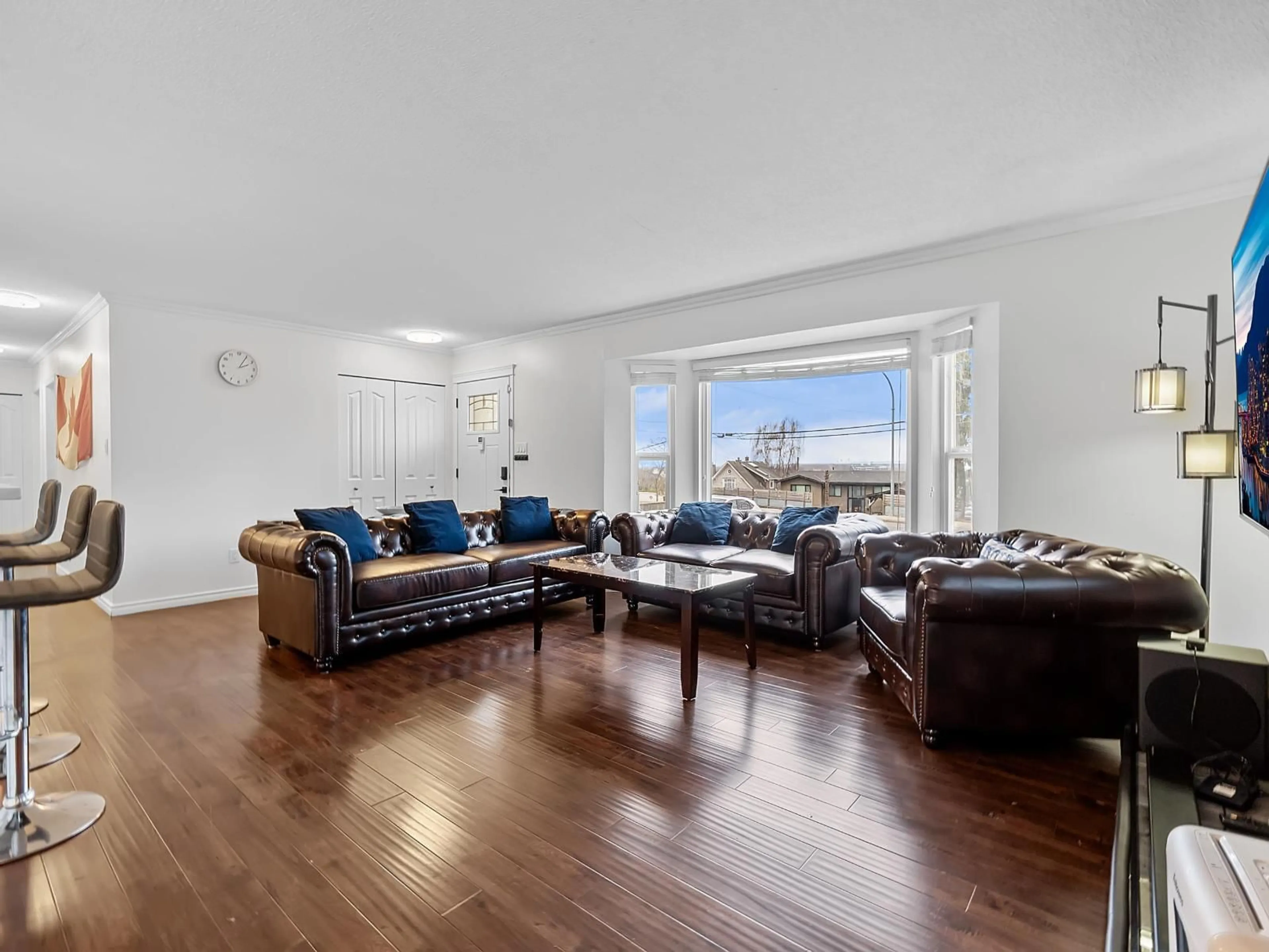 Living room with furniture, wood/laminate floor for 10746 RIVER ROAD, Delta British Columbia V4C2R9
