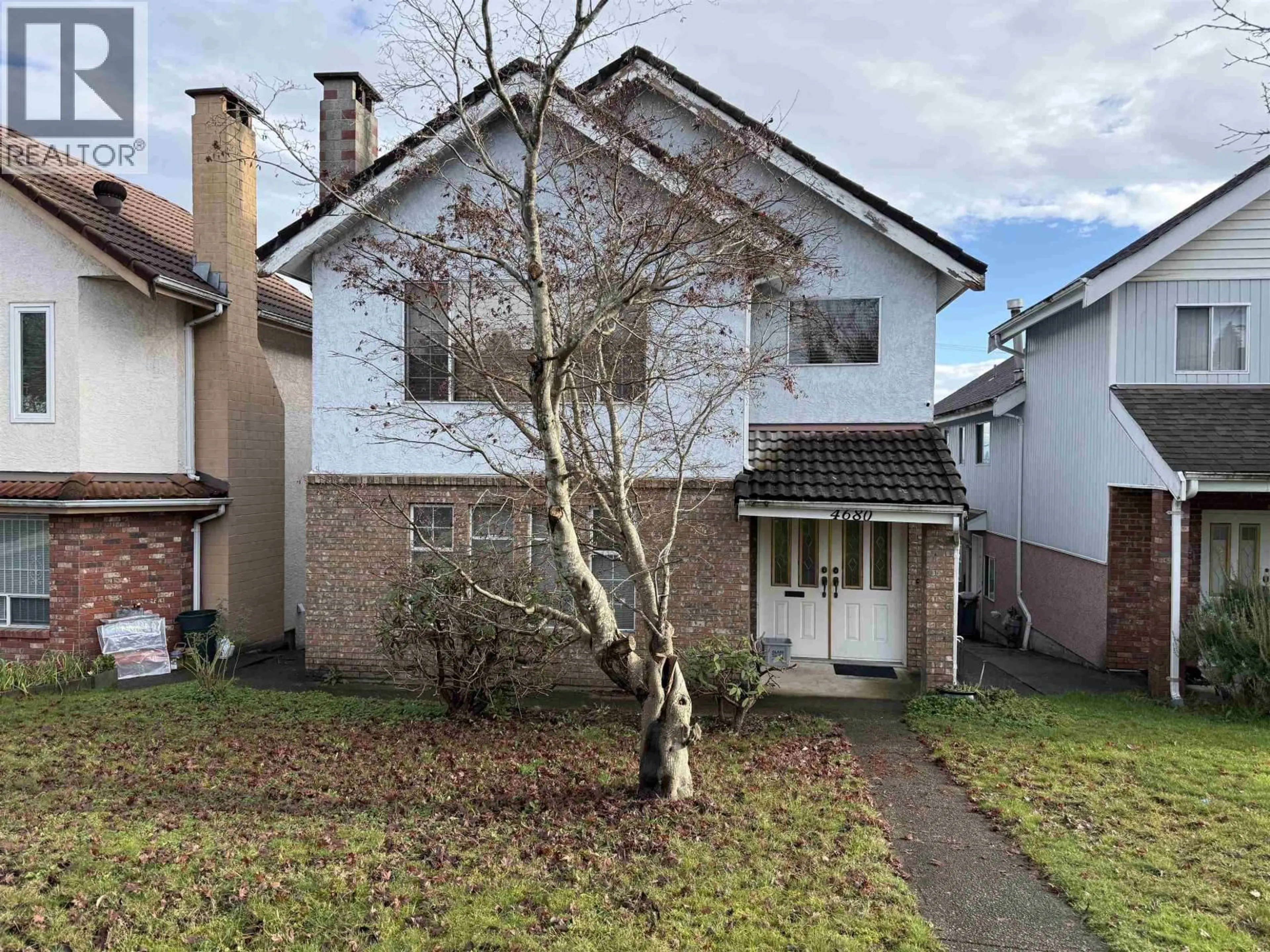 A pic from outside/outdoor area/front of a property/back of a property/a pic from drone, street for 4680 HOY STREET, Vancouver British Columbia V5R4N4