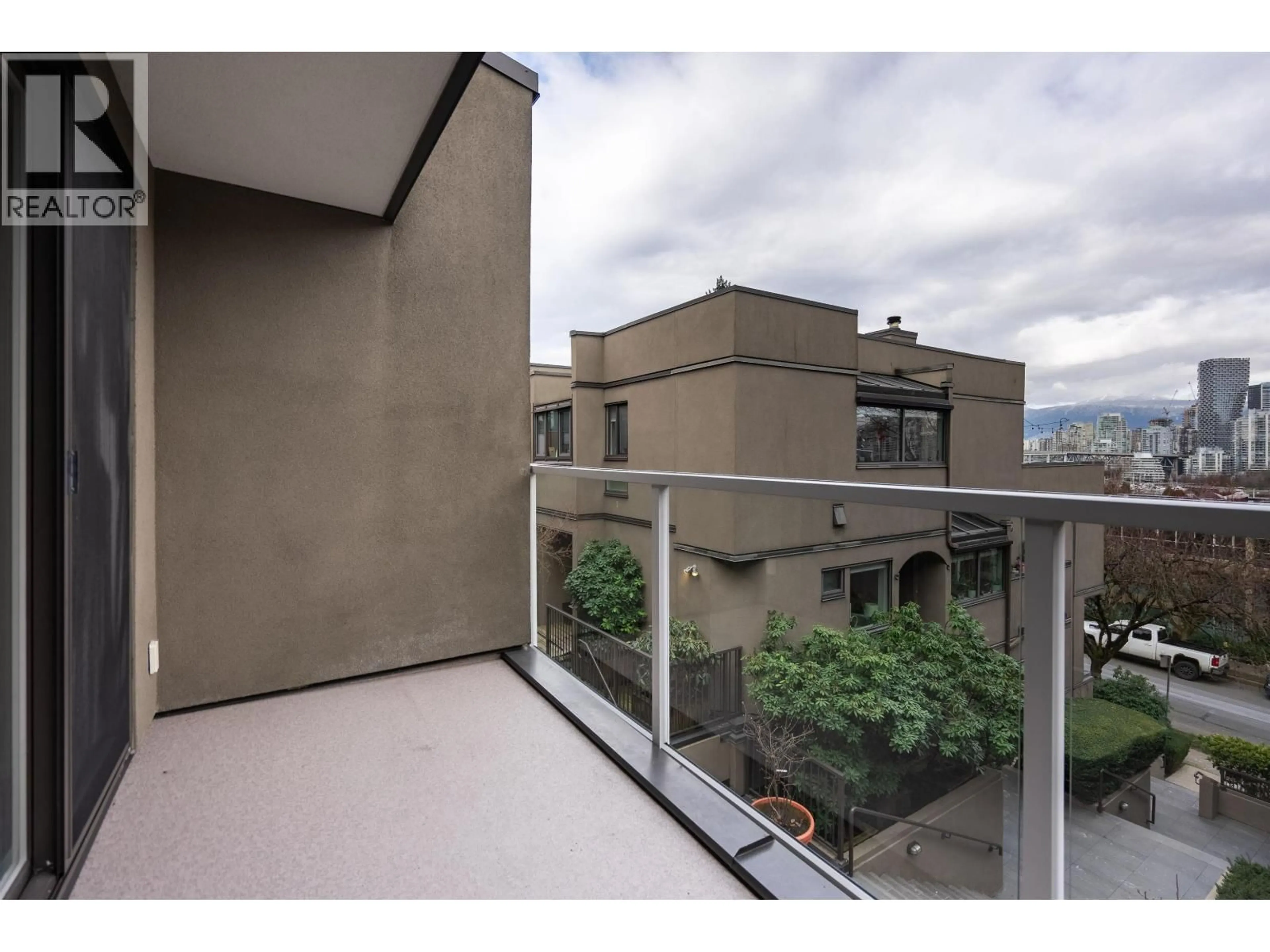 Balcony in the apartment, city buildings view from balcony for B3 - 1070 7TH AVENUE, Vancouver British Columbia V6H1B3