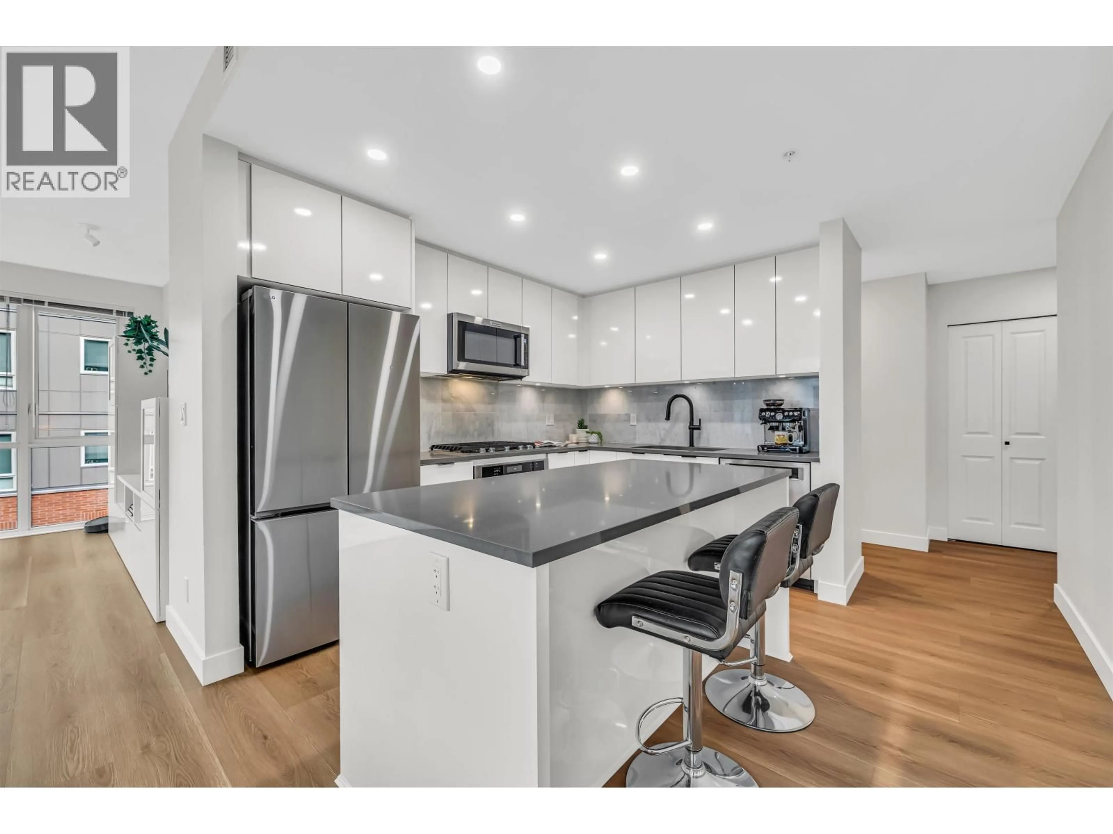 Open concept kitchen, unknown for 404 - 2632 LIBRARY LANE, North Vancouver British Columbia V7J0B8