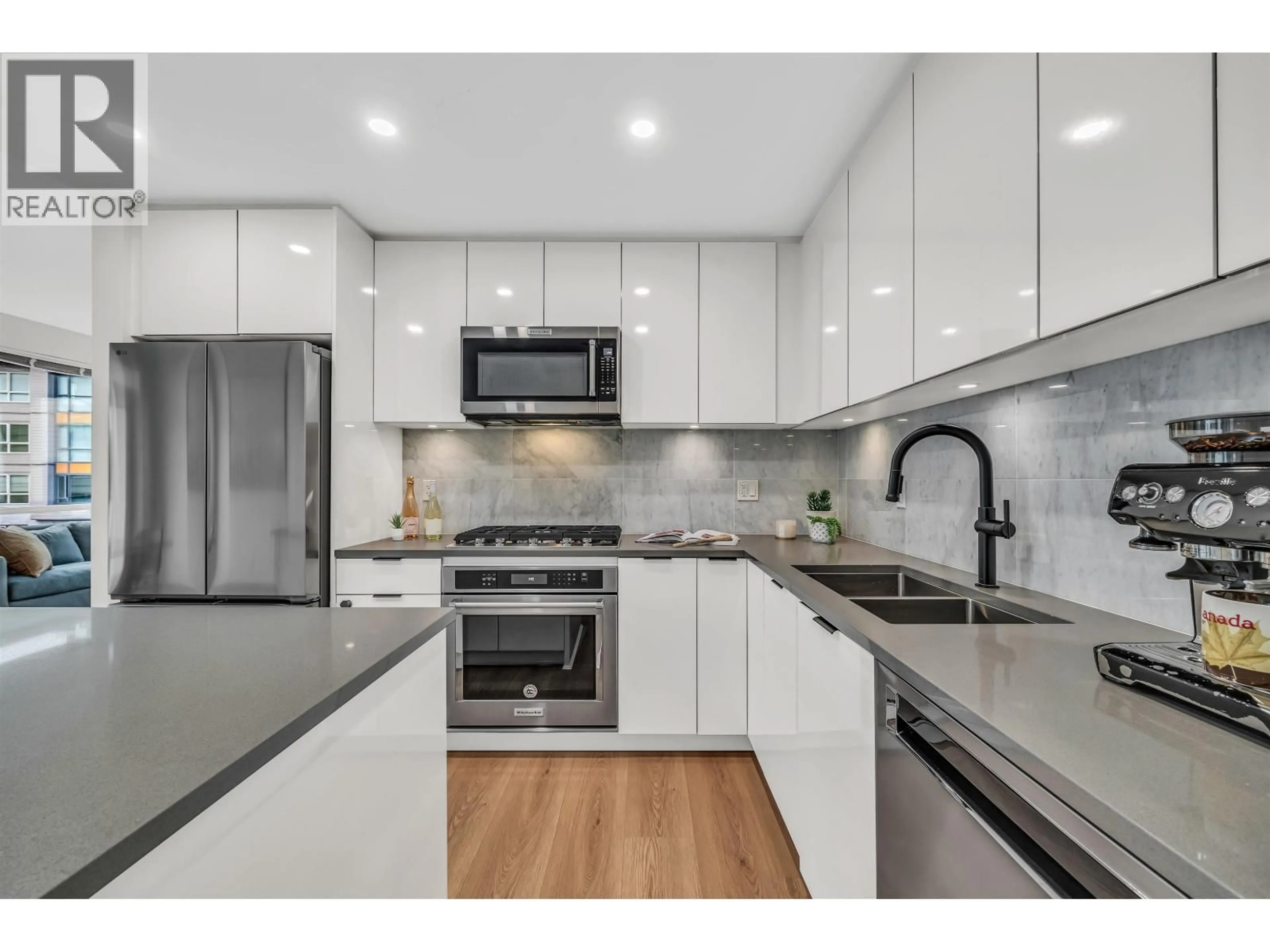 Open concept kitchen, unknown for 404 - 2632 LIBRARY LANE, North Vancouver British Columbia V7J0B8