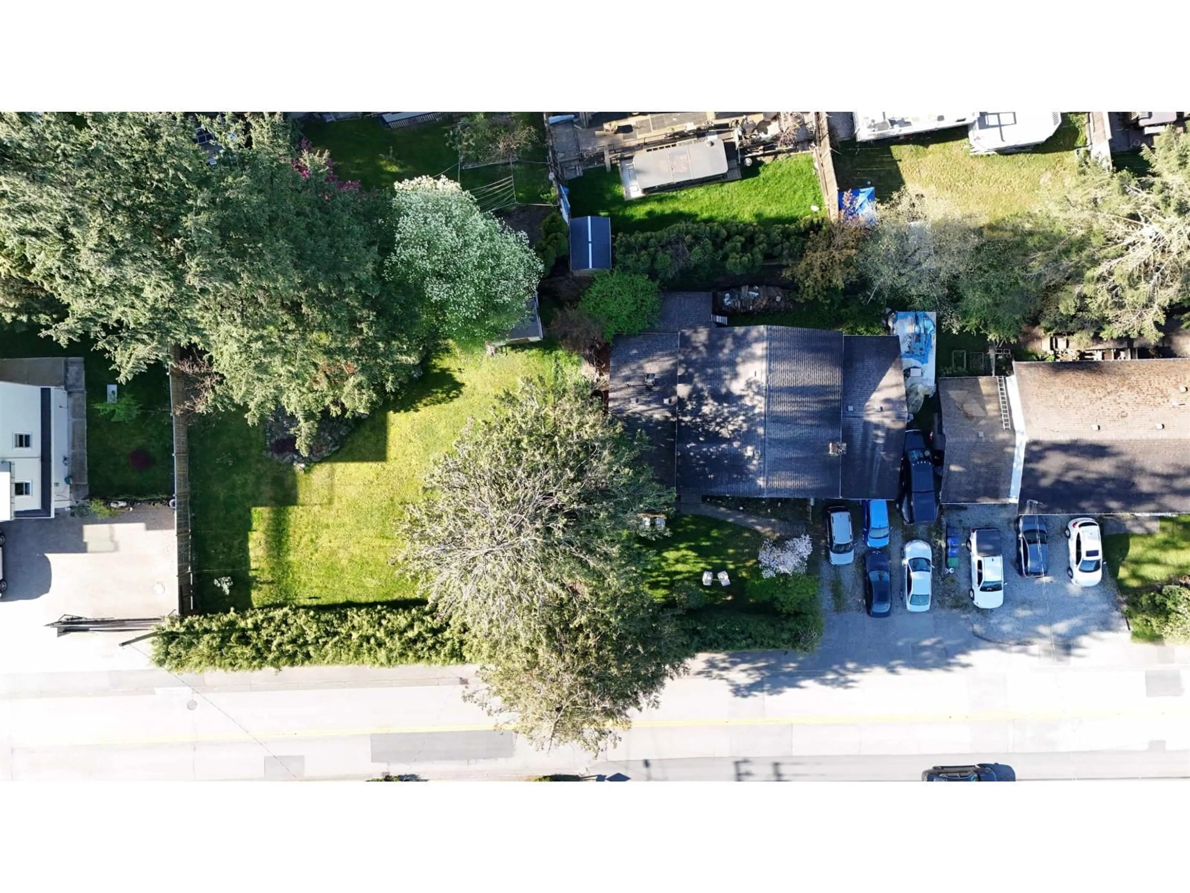 A pic from outside/outdoor area/front of a property/back of a property/a pic from drone, street for 11562 MILLAR ROAD, Surrey British Columbia V3V2T9