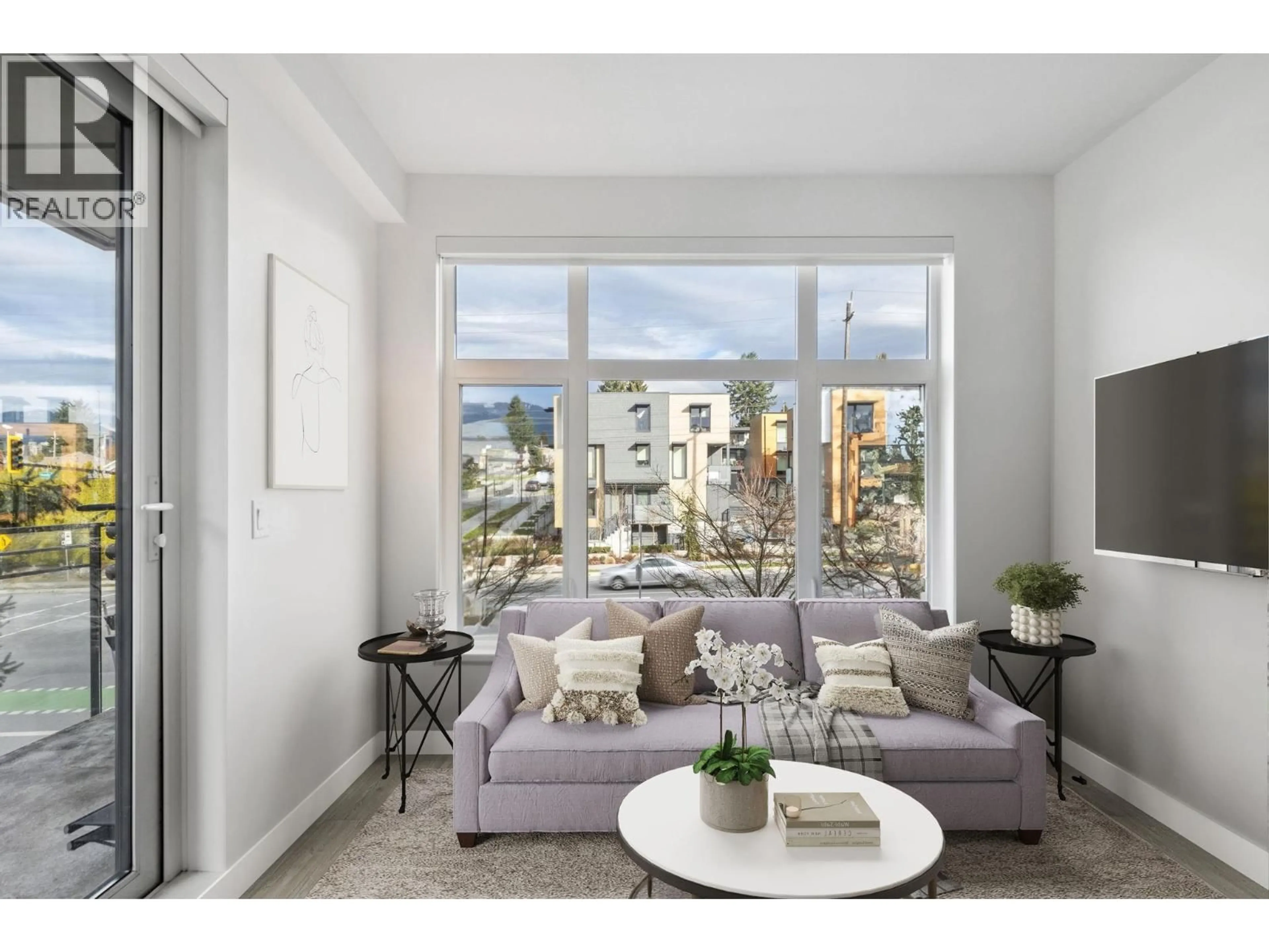 Living room with furniture, unknown for 201 - 707 3RD STREET, North Vancouver British Columbia V7L1G8