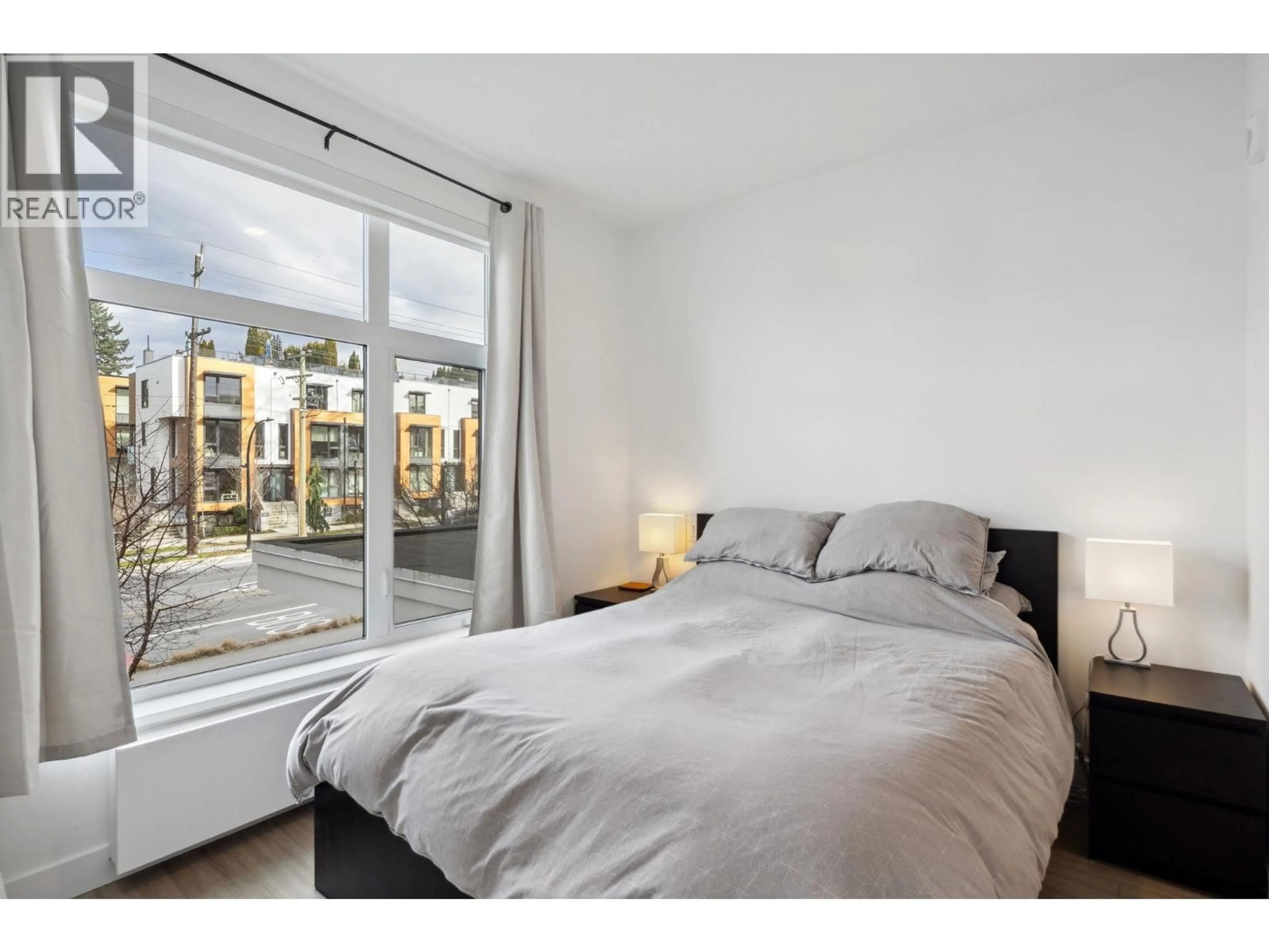 Bedroom with bed, unknown for 201 - 707 3RD STREET, North Vancouver British Columbia V7L1G8