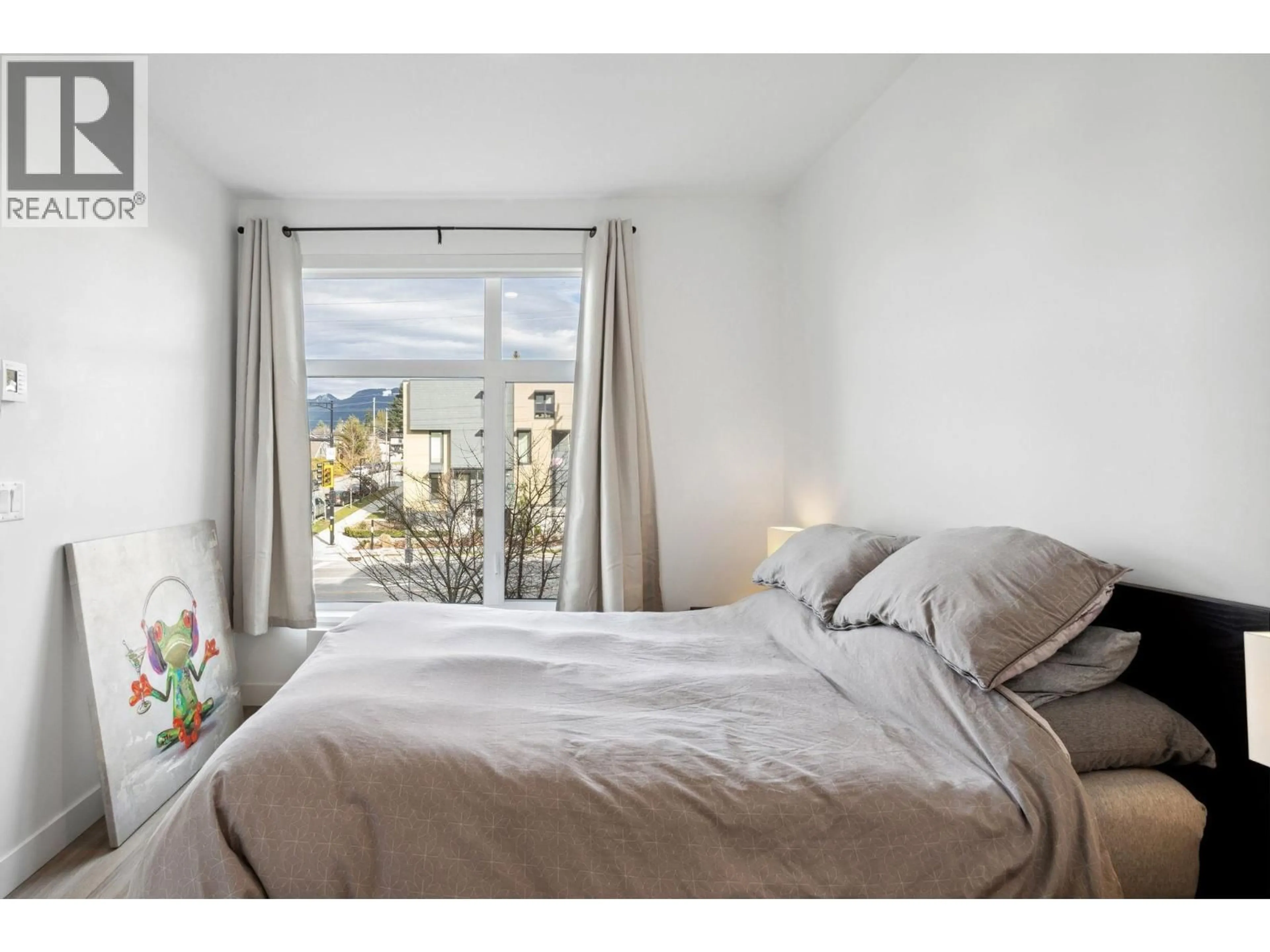 Bedroom with bed, unknown for 201 - 707 3RD STREET, North Vancouver British Columbia V7L1G8