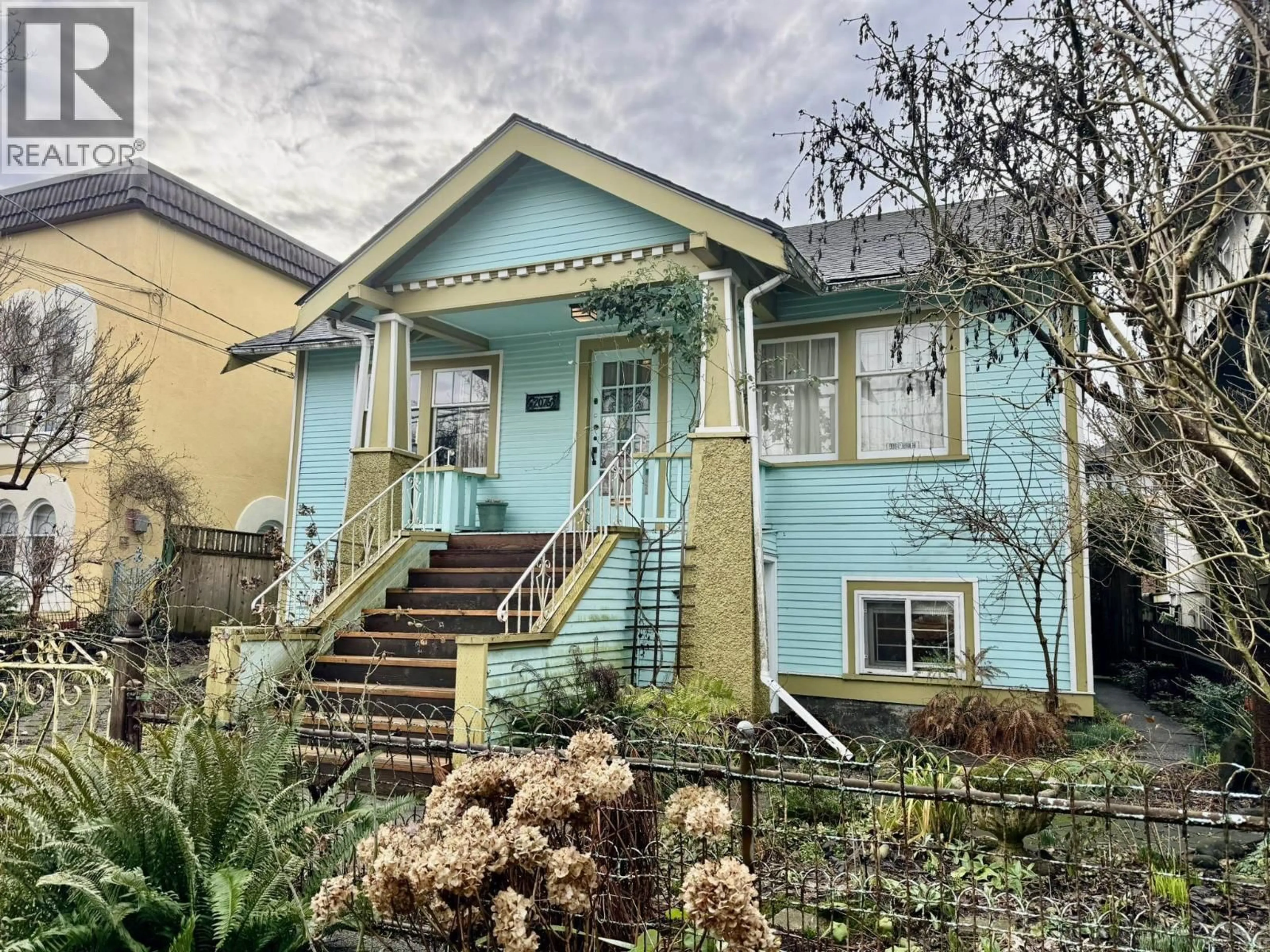 Home with vinyl exterior material, street for 2076 TURNER STREET, Vancouver British Columbia V5L2A3