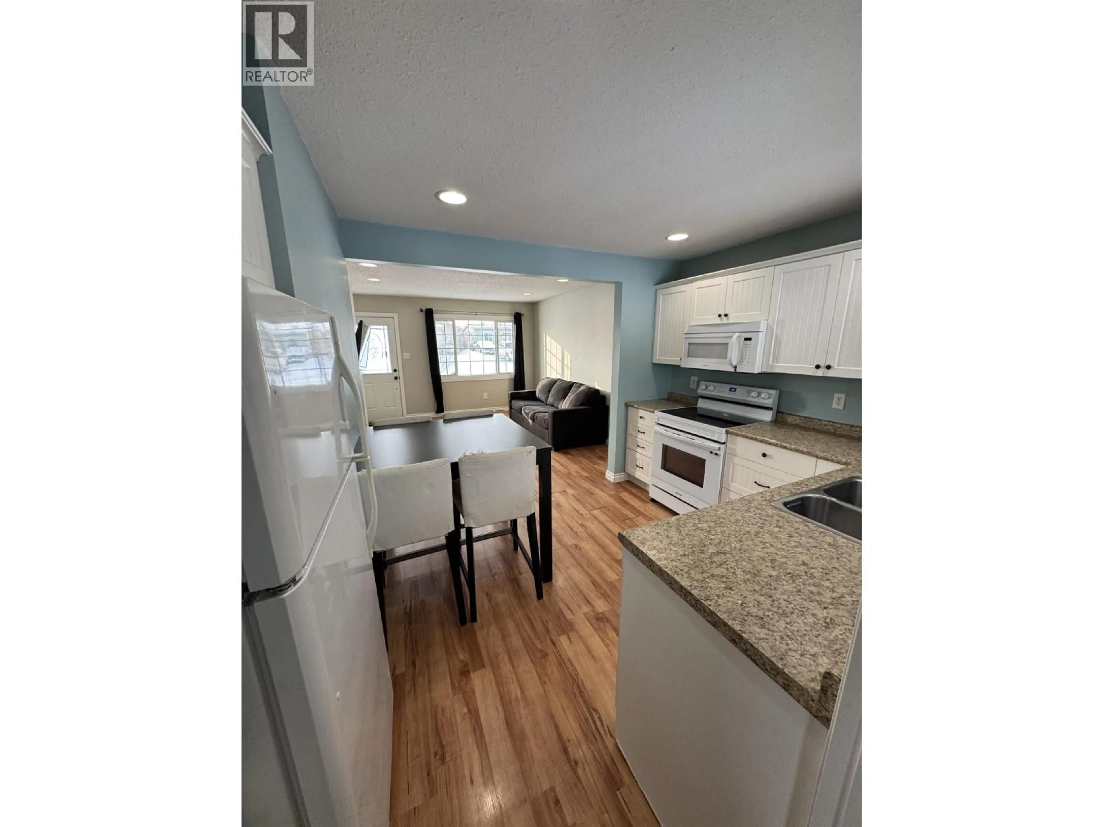 Open concept kitchen, unknown for 8320 96 AVENUE, Fort St. John British Columbia V1J1J8