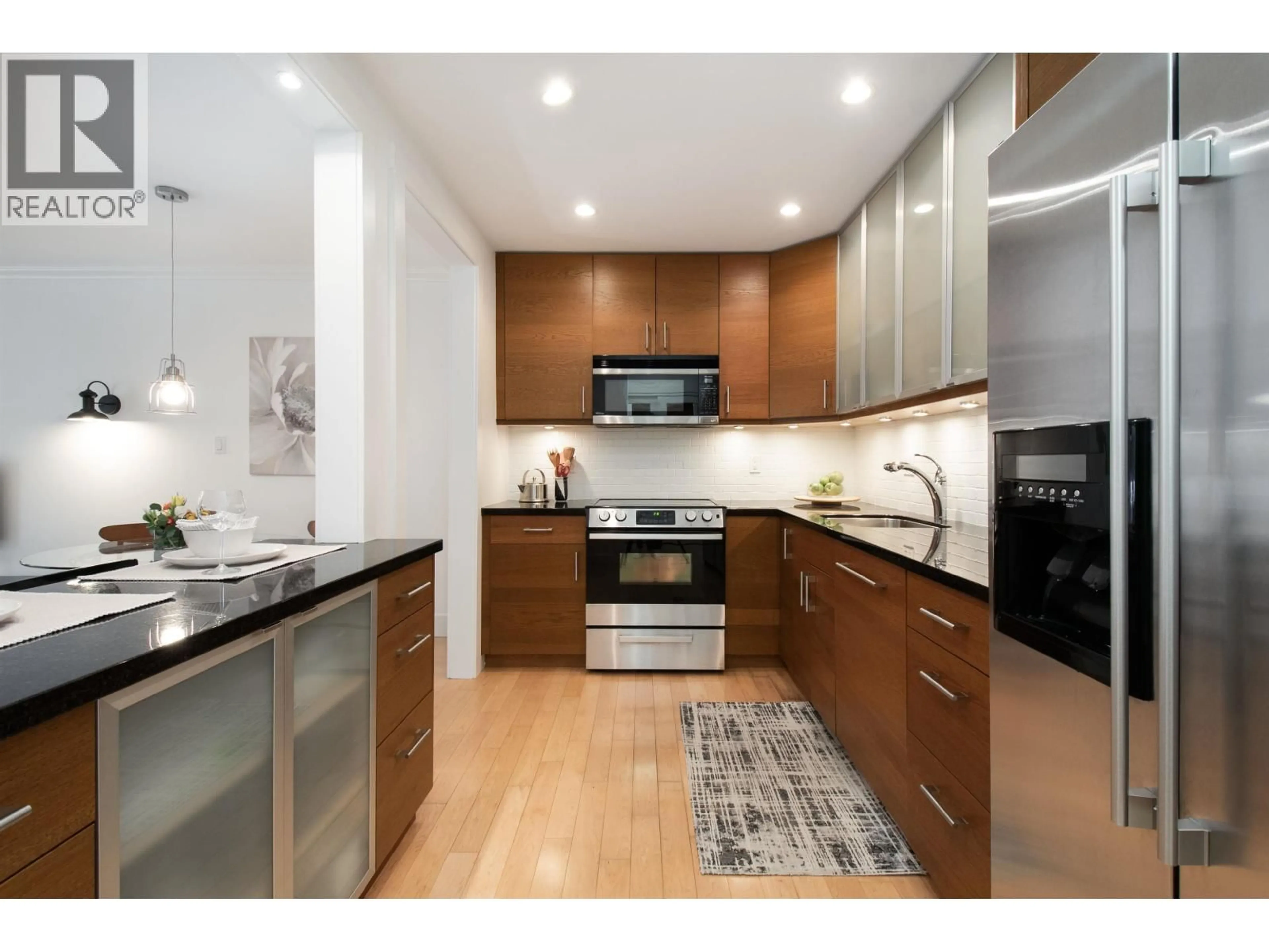 Open concept kitchen, unknown for 101 - 236 2ND STREET, North Vancouver British Columbia V7M1C6