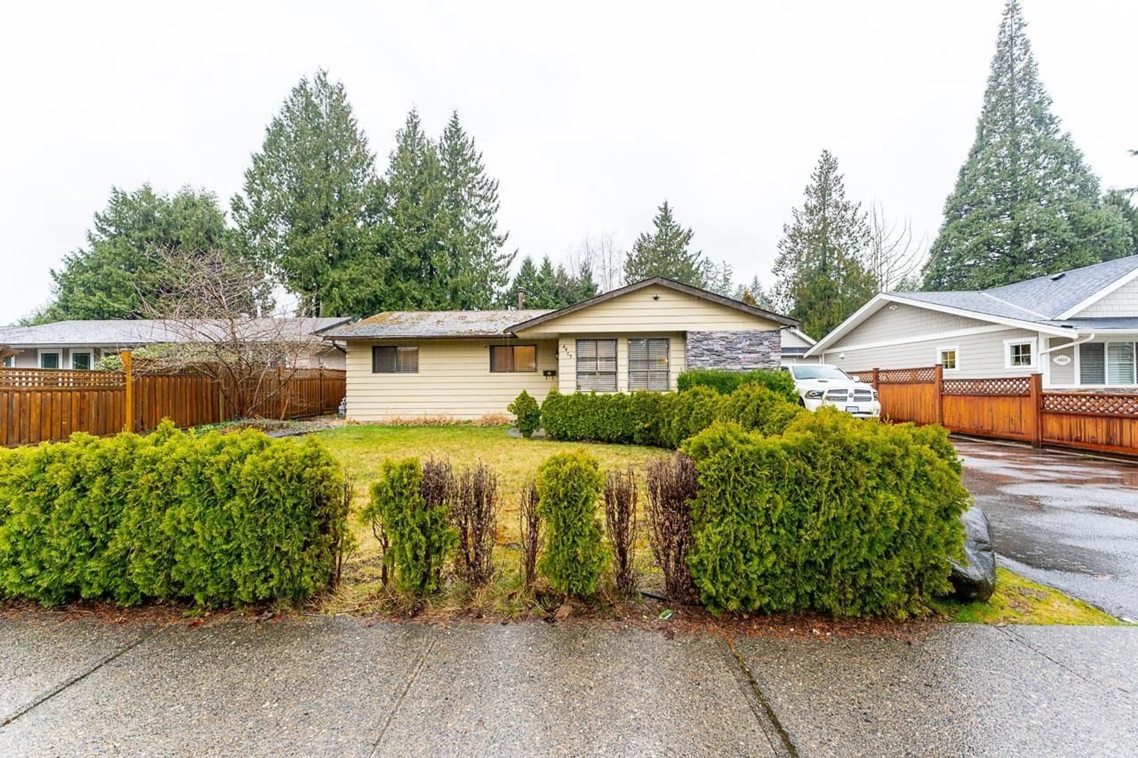 Home with vinyl exterior material, street for 4453 201 STREET, Langley British Columbia V3A6M4