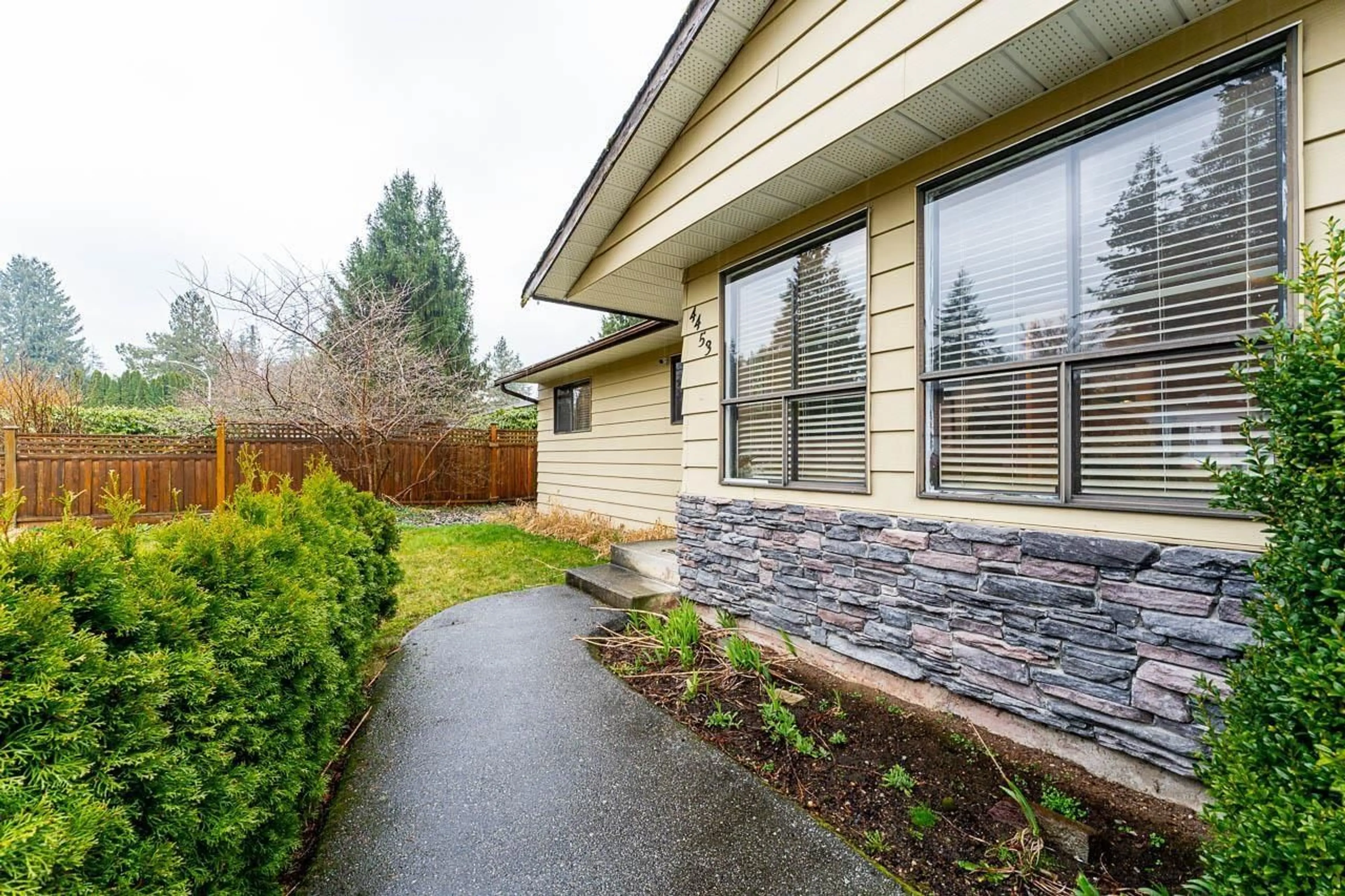 Home with vinyl exterior material, street for 4453 201 STREET, Langley British Columbia V3A6M4