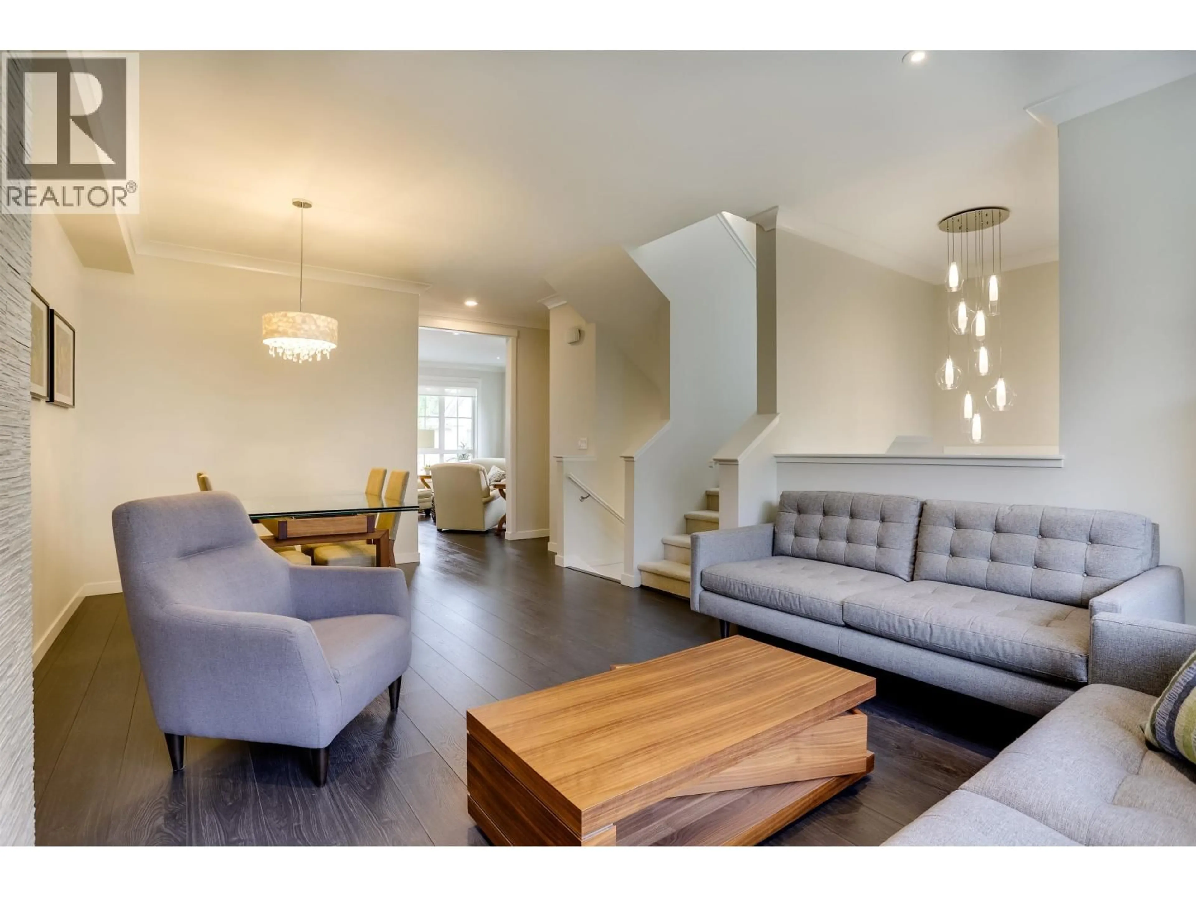 Living room with furniture, wood/laminate floor for 30 - 5510 ADMIRAL WAY, Delta British Columbia V4K0C3