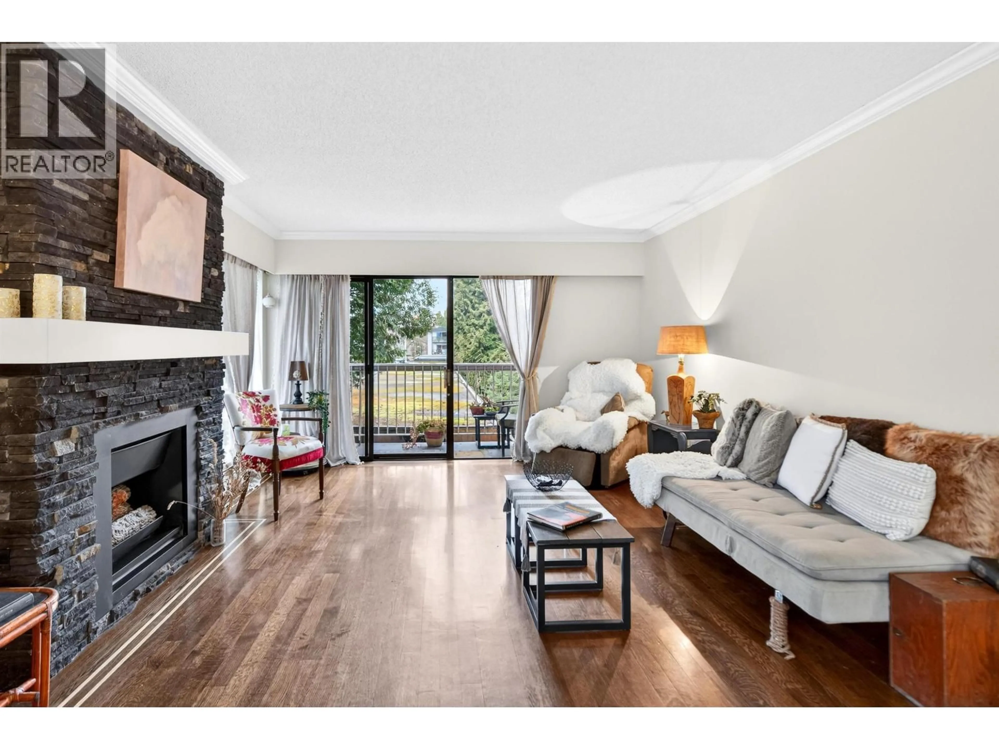 Living room with furniture, wood/laminate floor for 208 - 11957 223 STREET, Maple Ridge British Columbia V2X5Y4