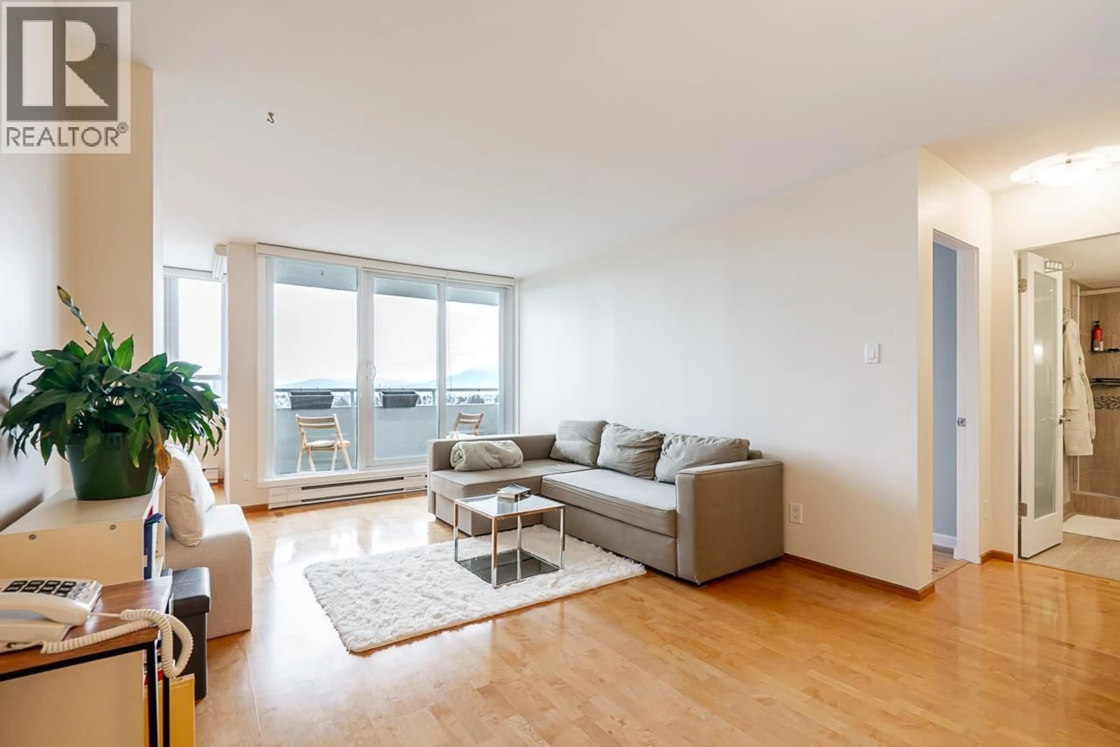 Living room with furniture, wood/laminate floor for 1404 - 4160 SARDIS STREET, Burnaby British Columbia V5H1K2