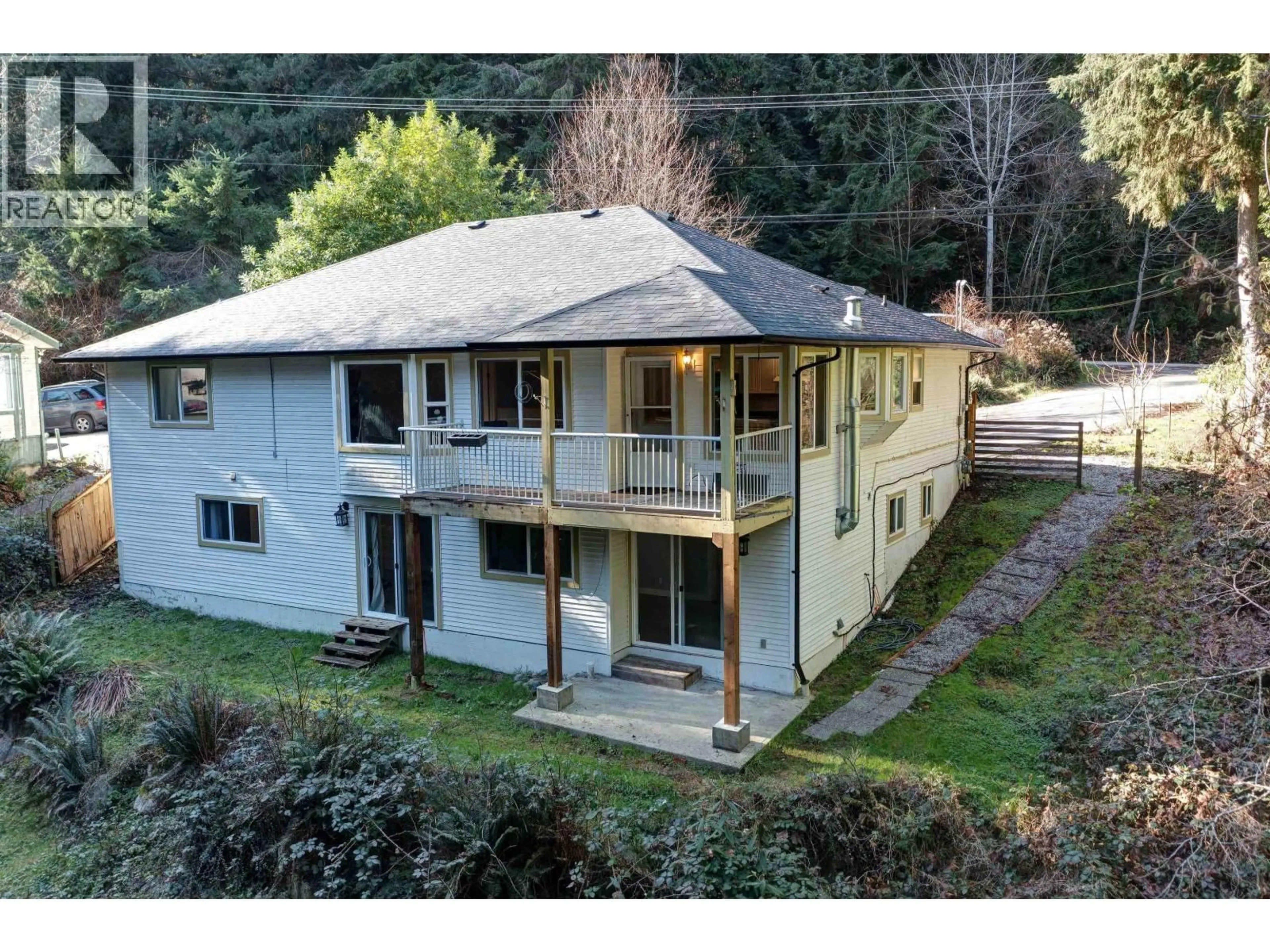 A pic from outside/outdoor area/front of a property/back of a property/a pic from drone, unknown for 7629 REDROOFFS ROAD, Halfmoon Bay British Columbia V7Z1C4