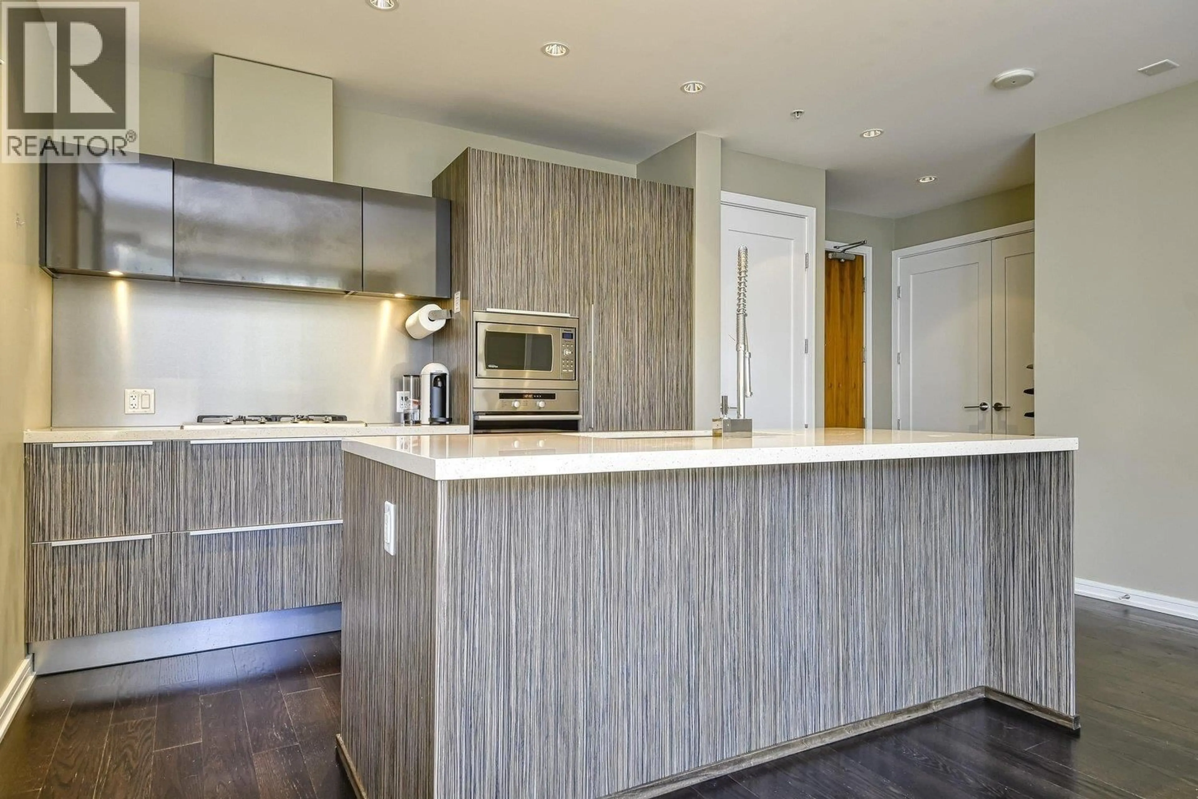 Contemporary kitchen, wood/laminate floor for 310 - 1616 COLUMBIA STREET, Vancouver British Columbia V5Y0B7