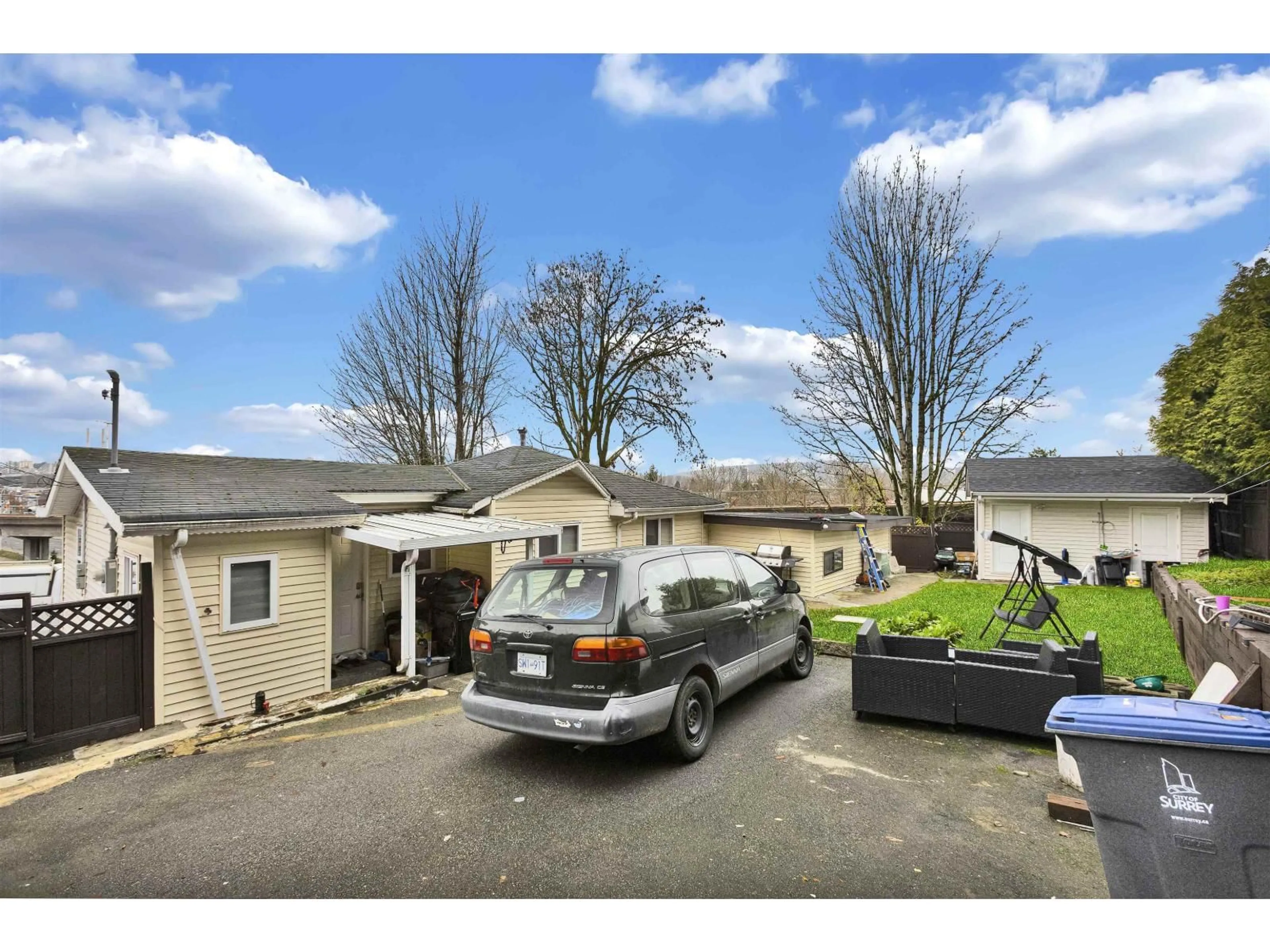 A pic from outside/outdoor area/front of a property/back of a property/a pic from drone, street for 12943 112 AVENUE, Surrey British Columbia V3T2S6