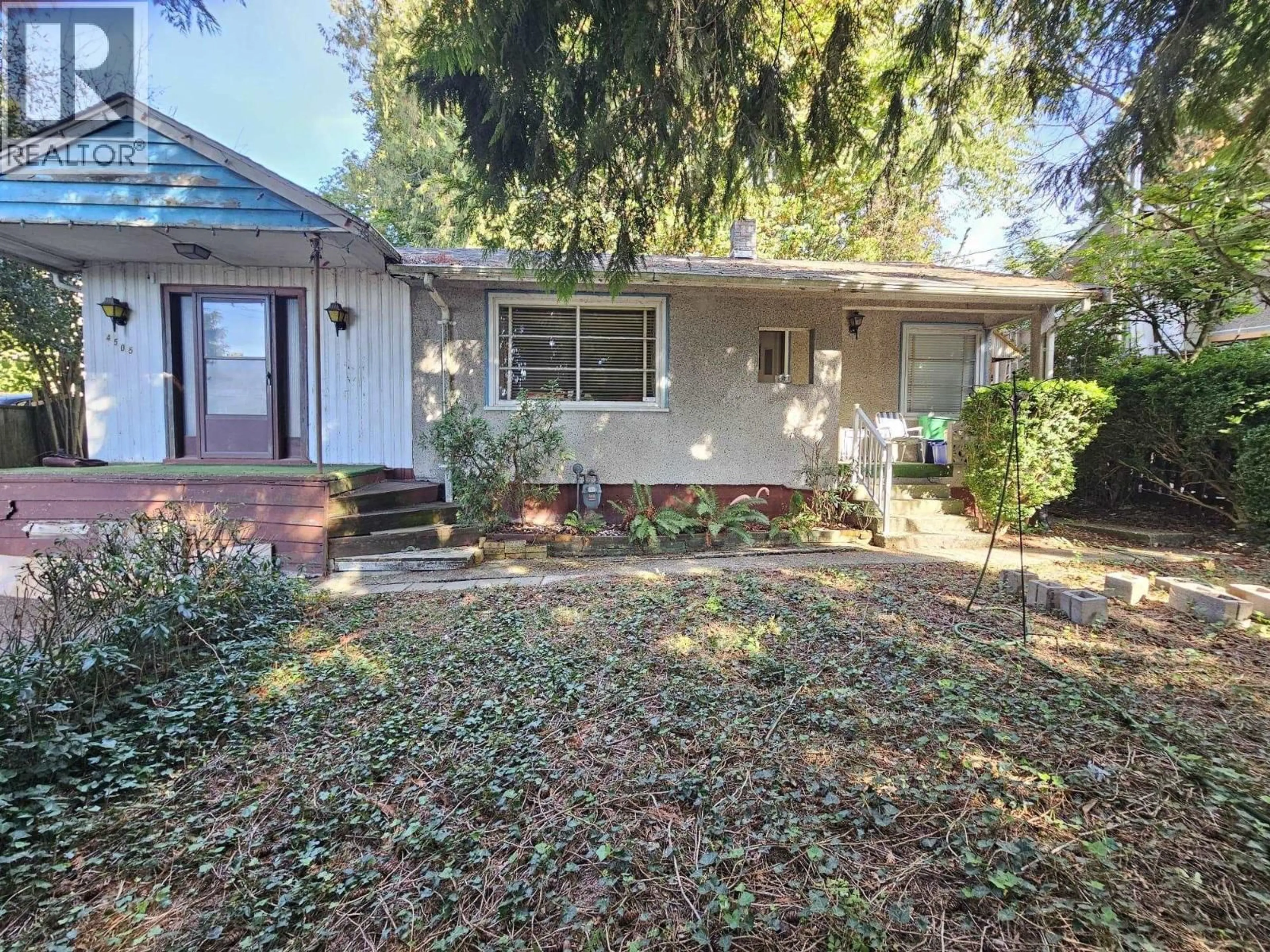 Home with vinyl exterior material, street for 4505 MARINE DRIVE, Burnaby British Columbia V5J3G1