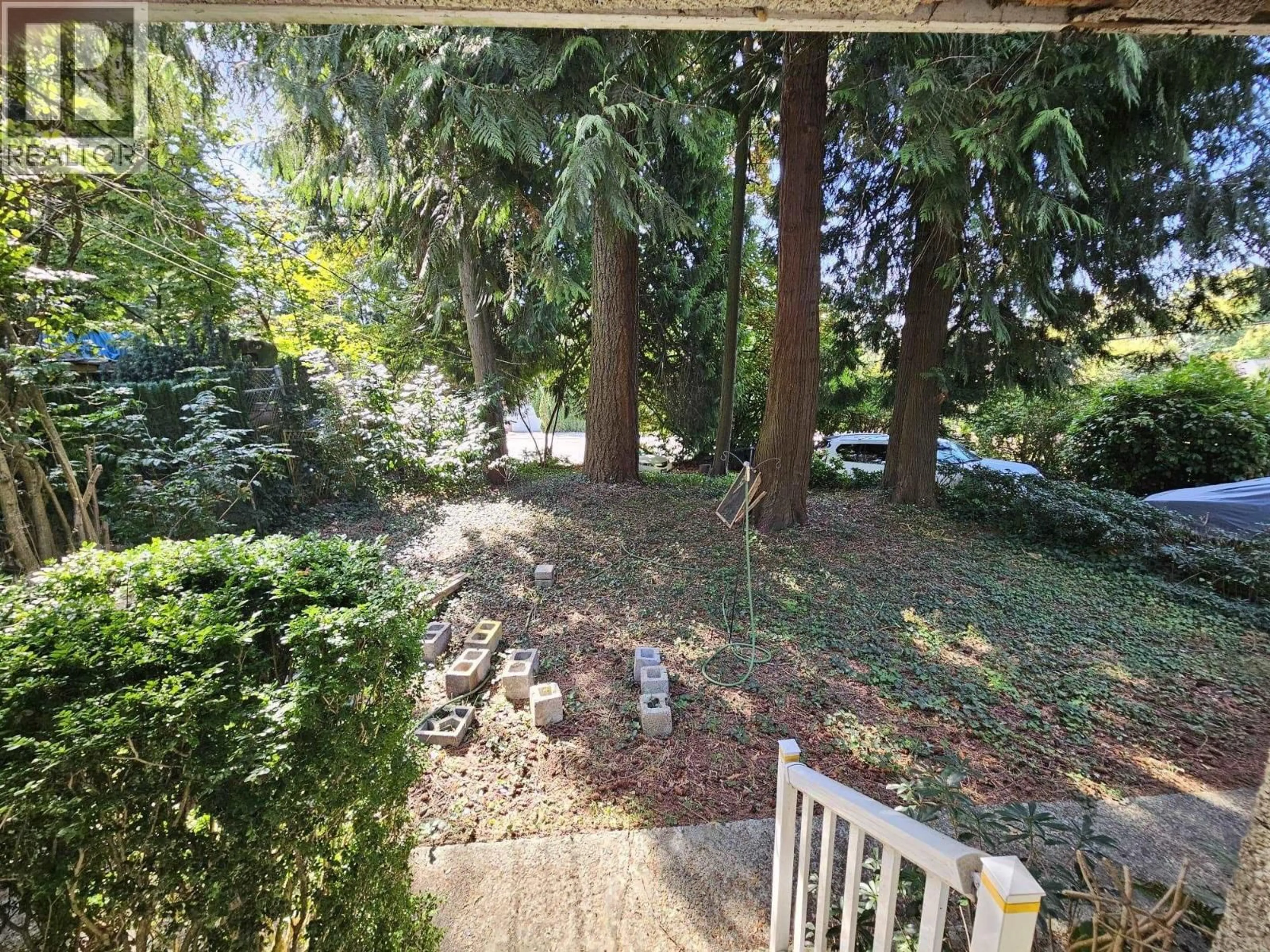A pic from outside/outdoor area/front of a property/back of a property/a pic from drone, forest/trees view for 4505 MARINE DRIVE, Burnaby British Columbia V5J3G1