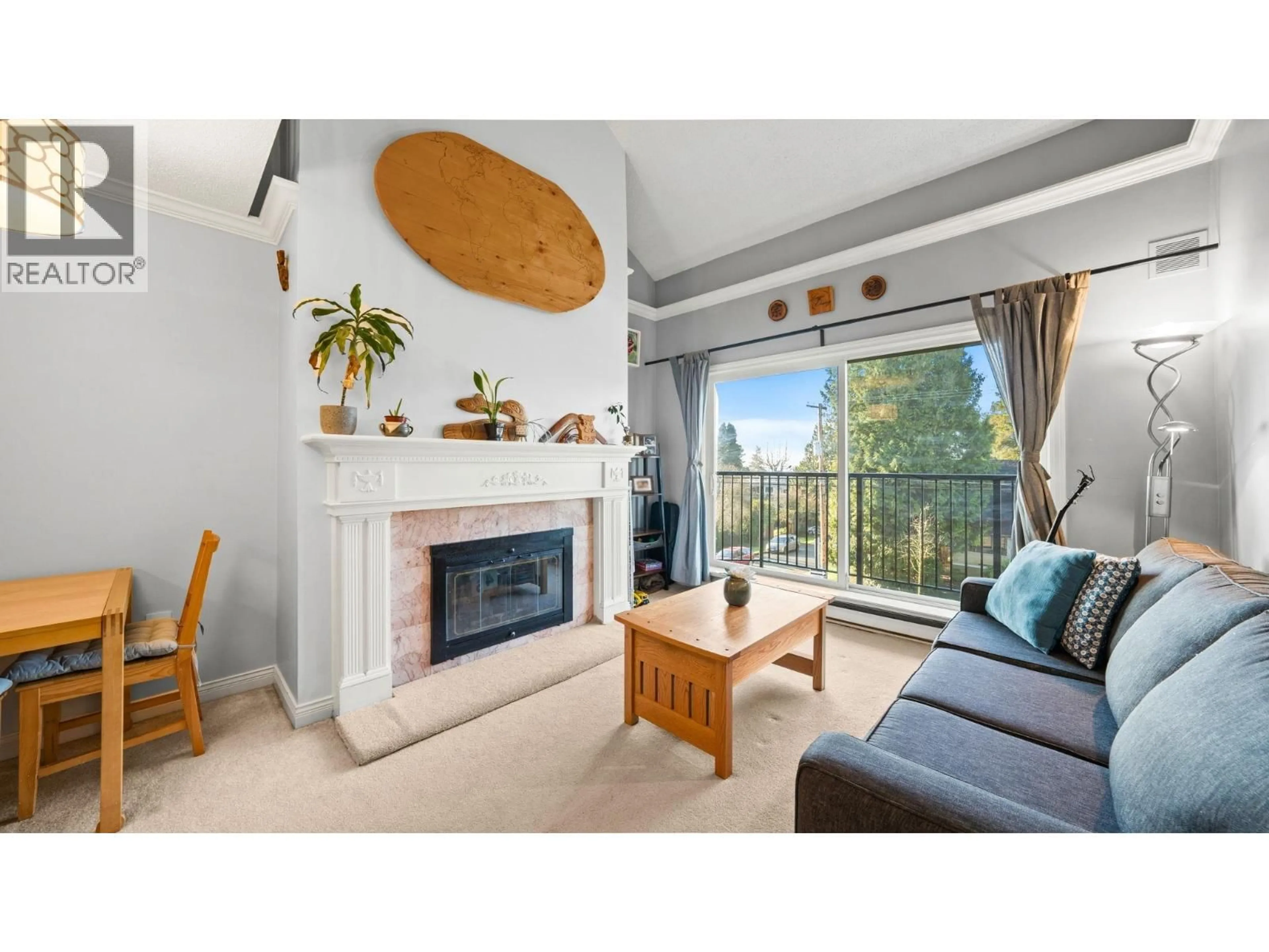 Living room with furniture, wood/laminate floor for 302 - 620 BLACKFORD STREET, New Westminster British Columbia V3M1R6