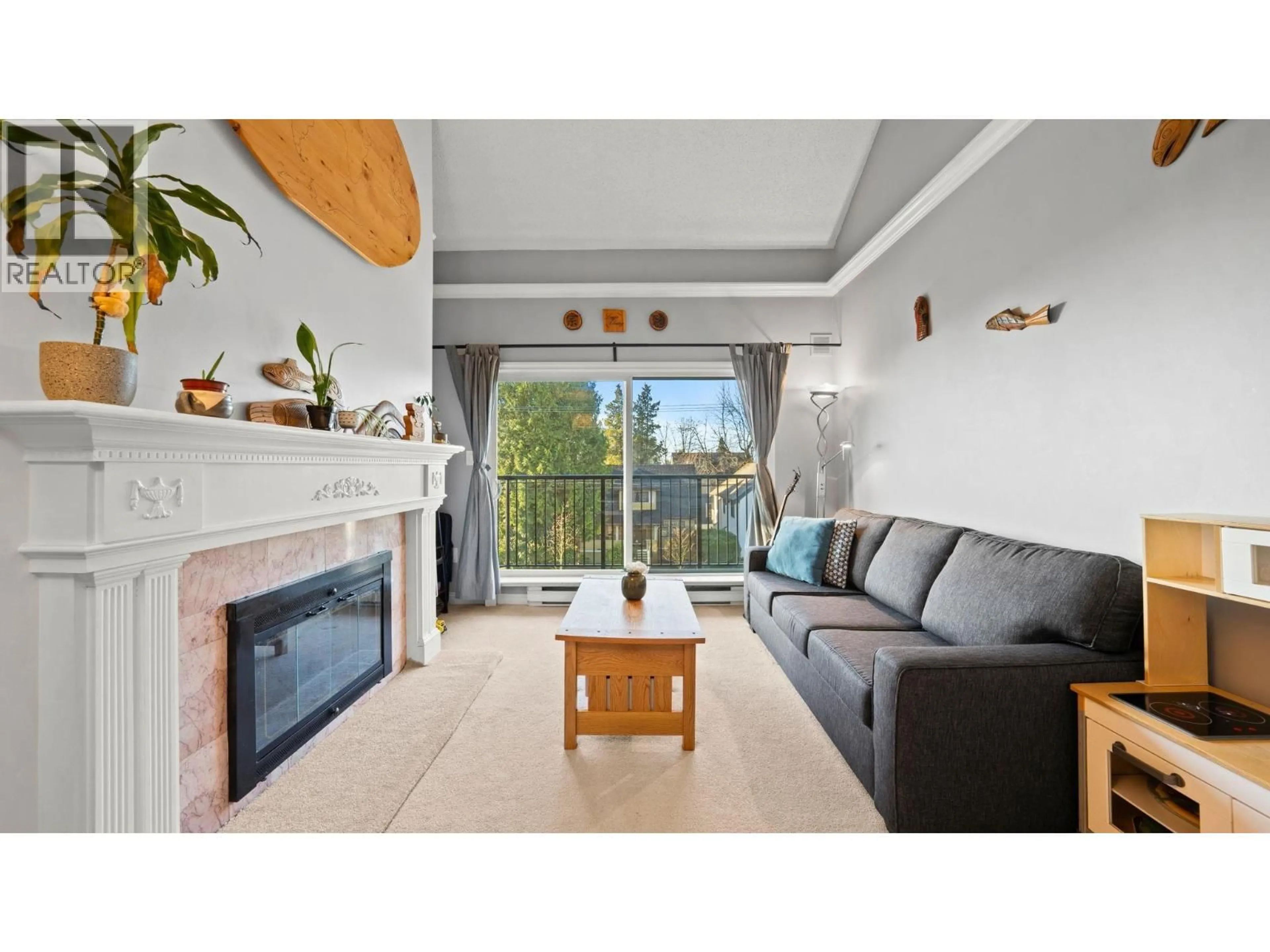 Living room with furniture, wood/laminate floor for 302 - 620 BLACKFORD STREET, New Westminster British Columbia V3M1R6