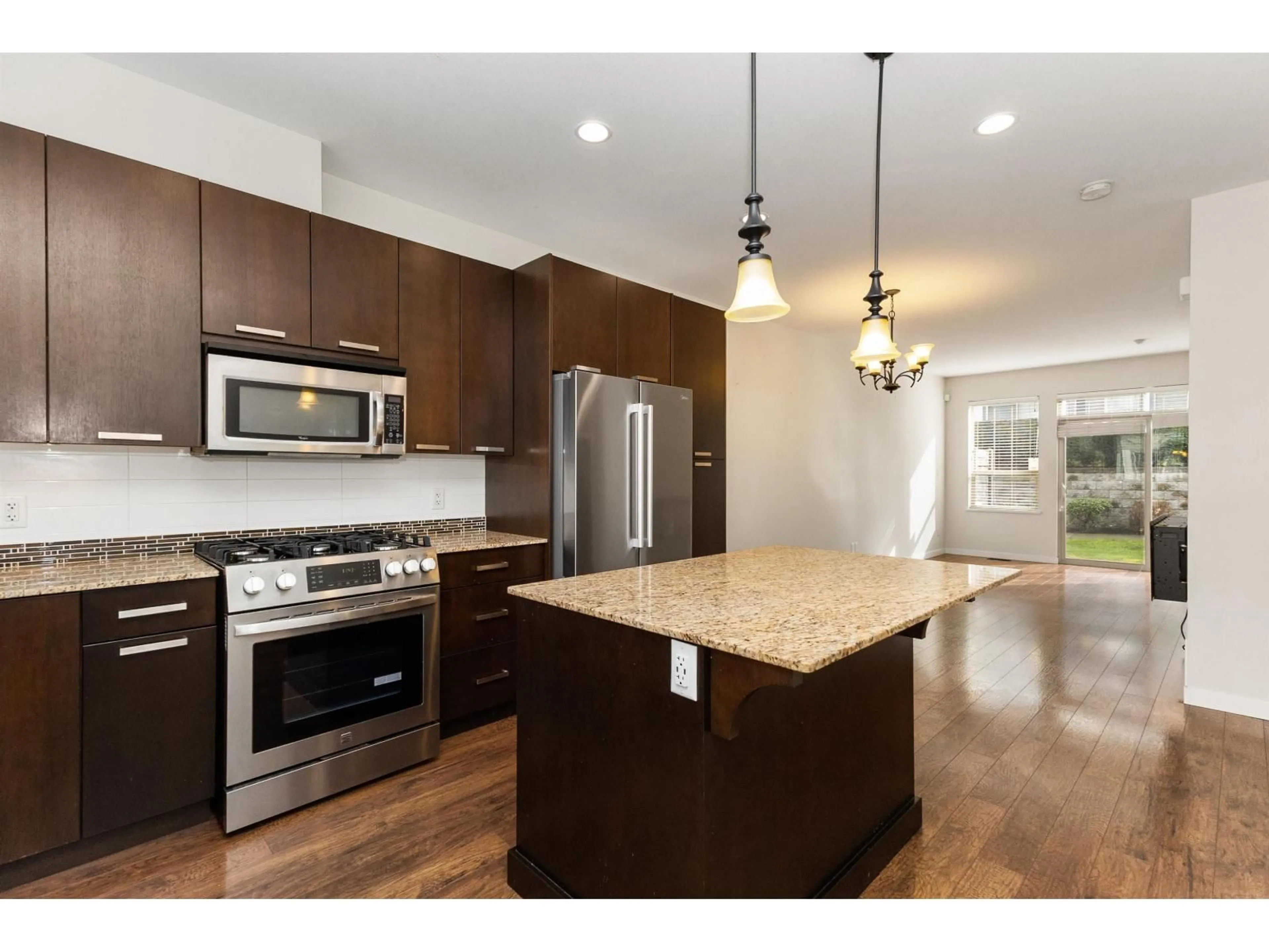 Open concept kitchen, wood/laminate floor for 57 - 34248 KING ROAD, Abbotsford British Columbia V2S0B1