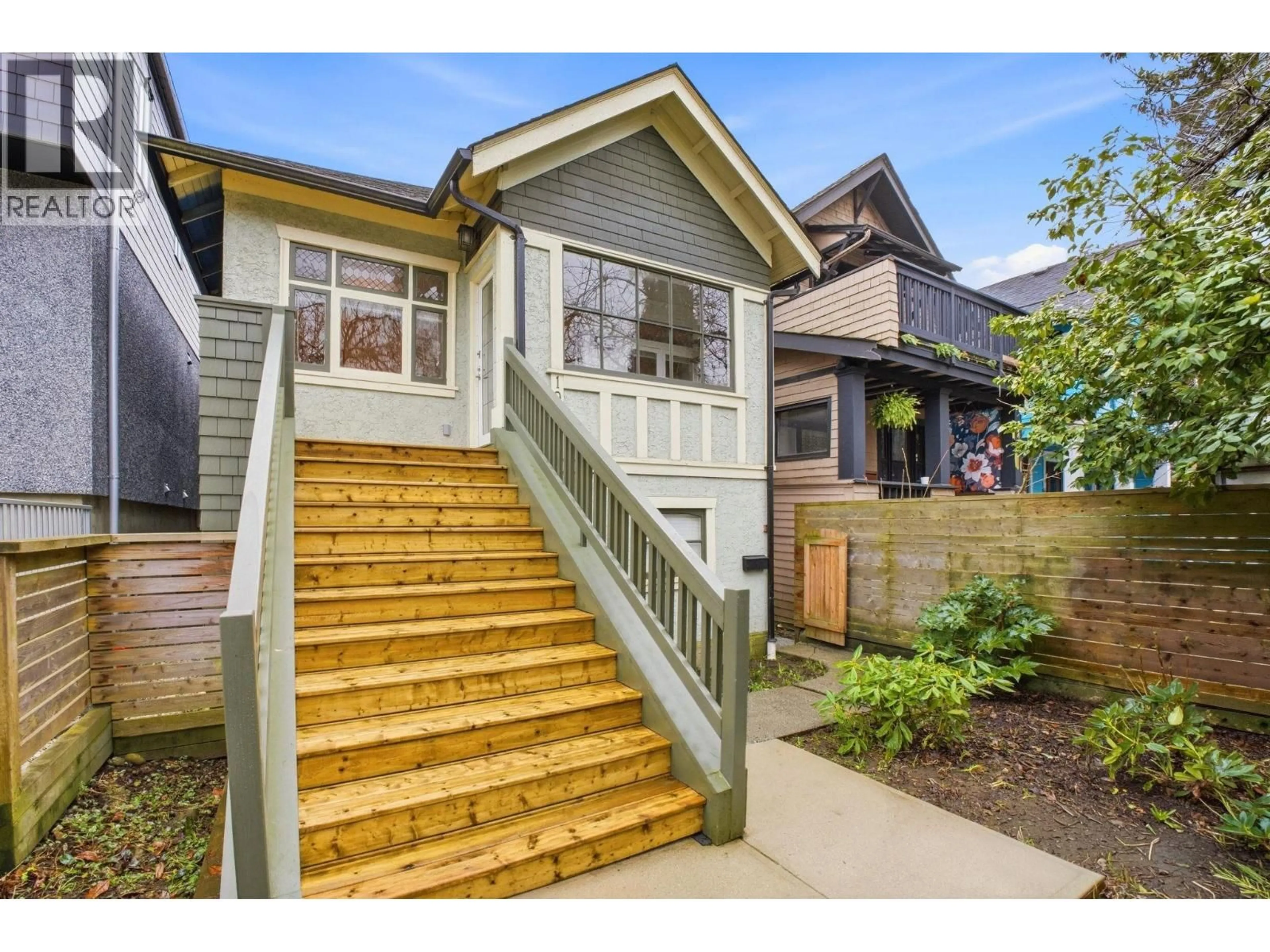 Home with vinyl exterior material, street for 1944 CHARLES STREET, Vancouver British Columbia V5L2T9