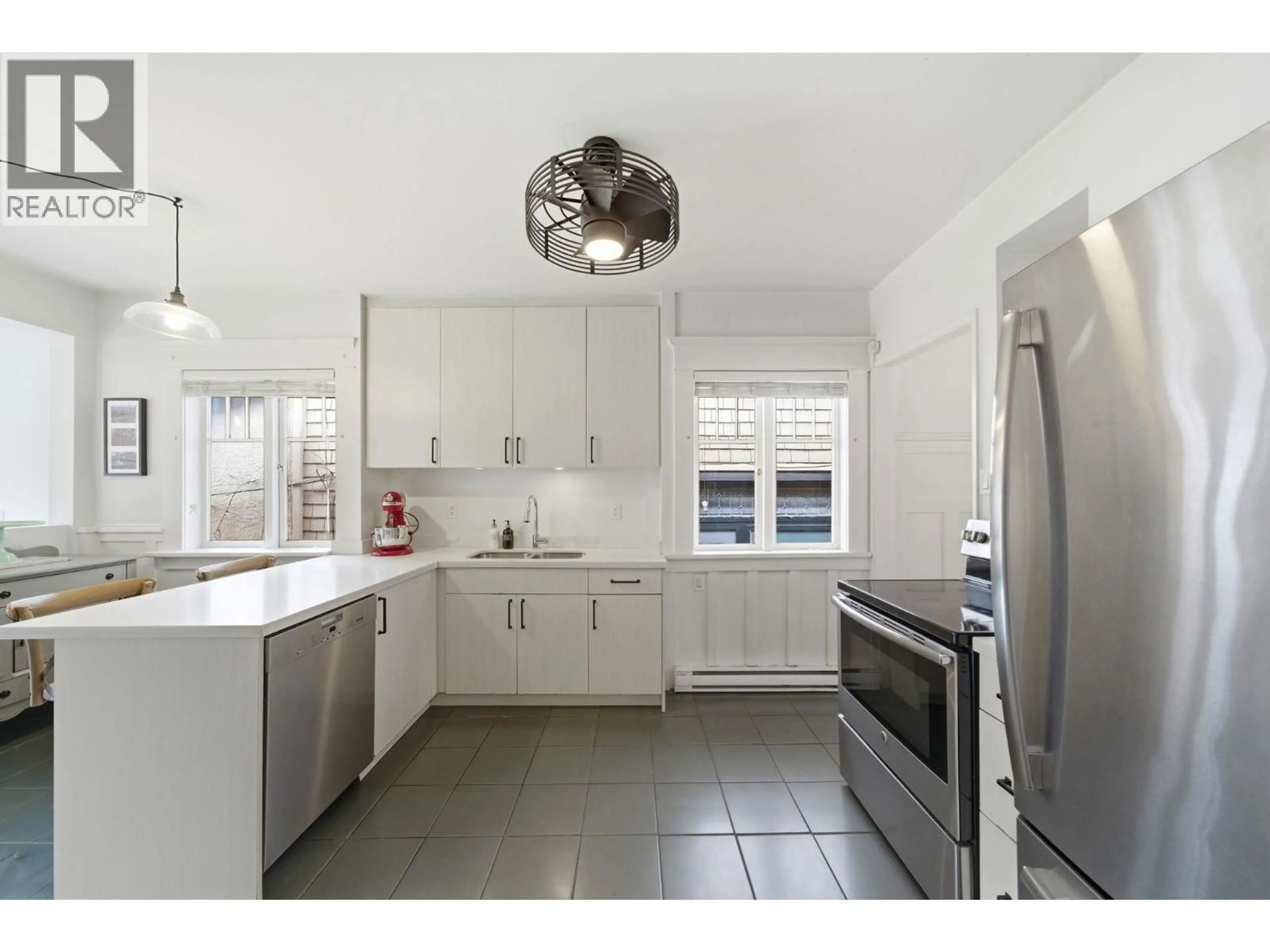 Open concept kitchen, ceramic/tile floor for 1944 CHARLES STREET, Vancouver British Columbia V5L2T9