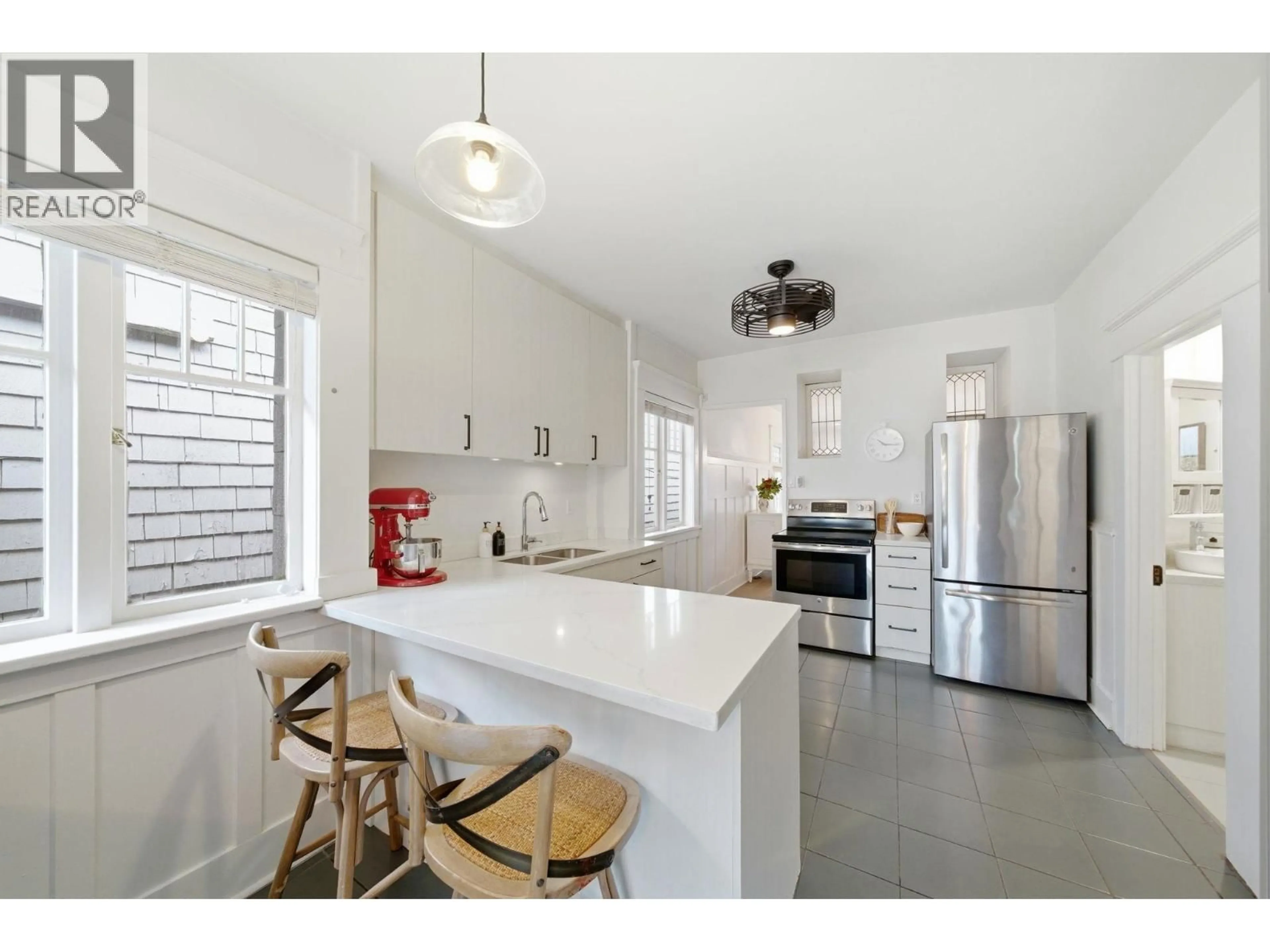 Open concept kitchen, ceramic/tile floor for 1944 CHARLES STREET, Vancouver British Columbia V5L2T9