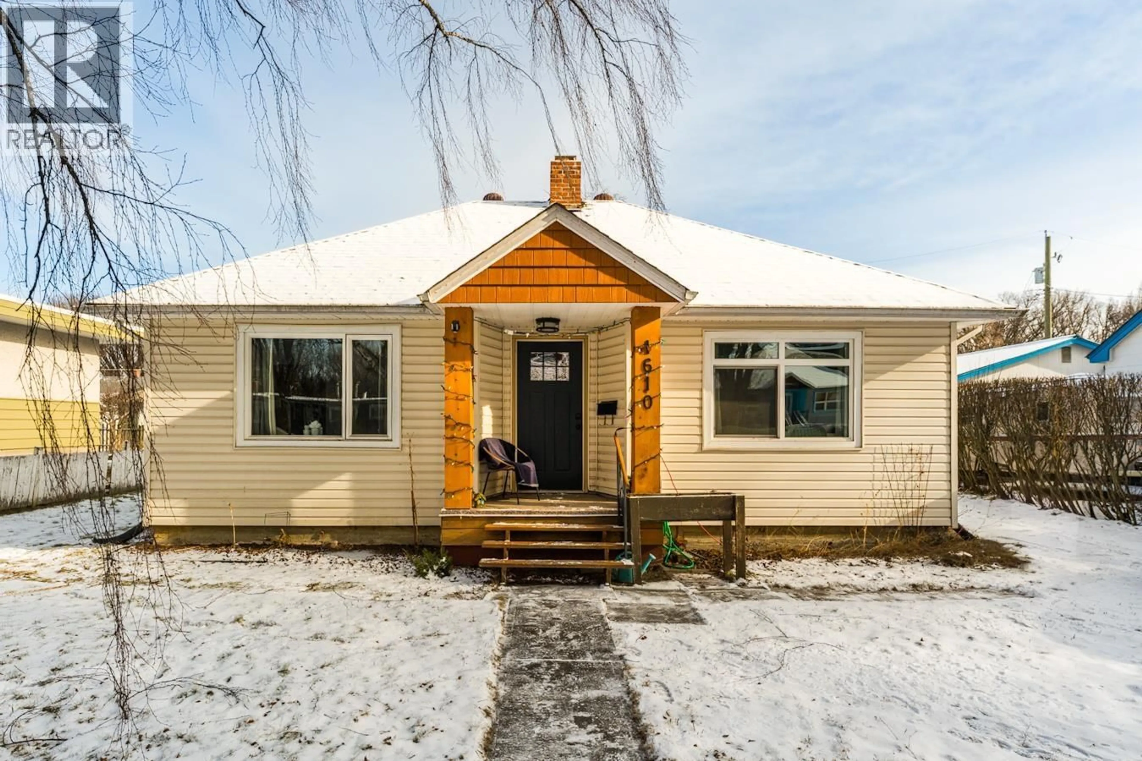 Home with vinyl exterior material, street for 1610 ELM STREET, Prince George British Columbia V2L1C8