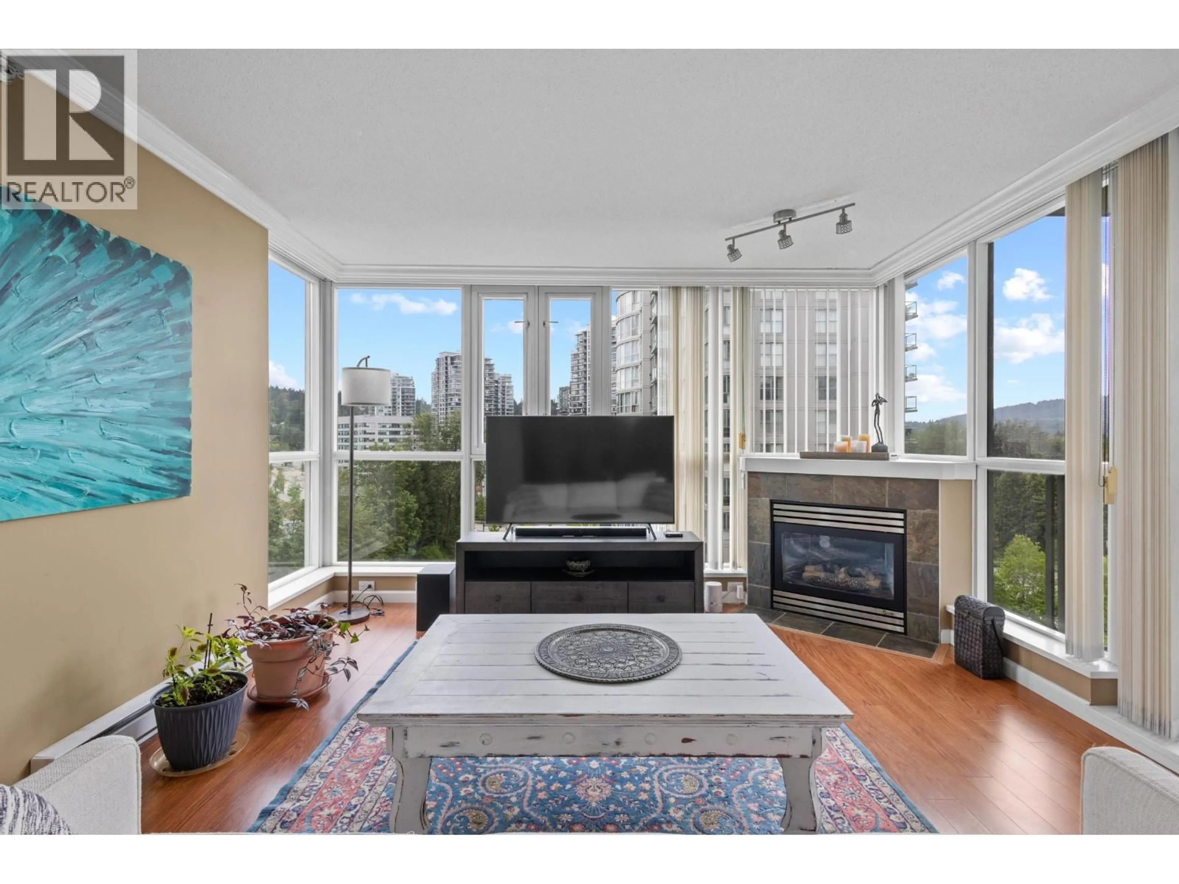 Living room with furniture, unknown for 903 - 235 GUILDFORD WAY, Port Moody British Columbia V3H5L8