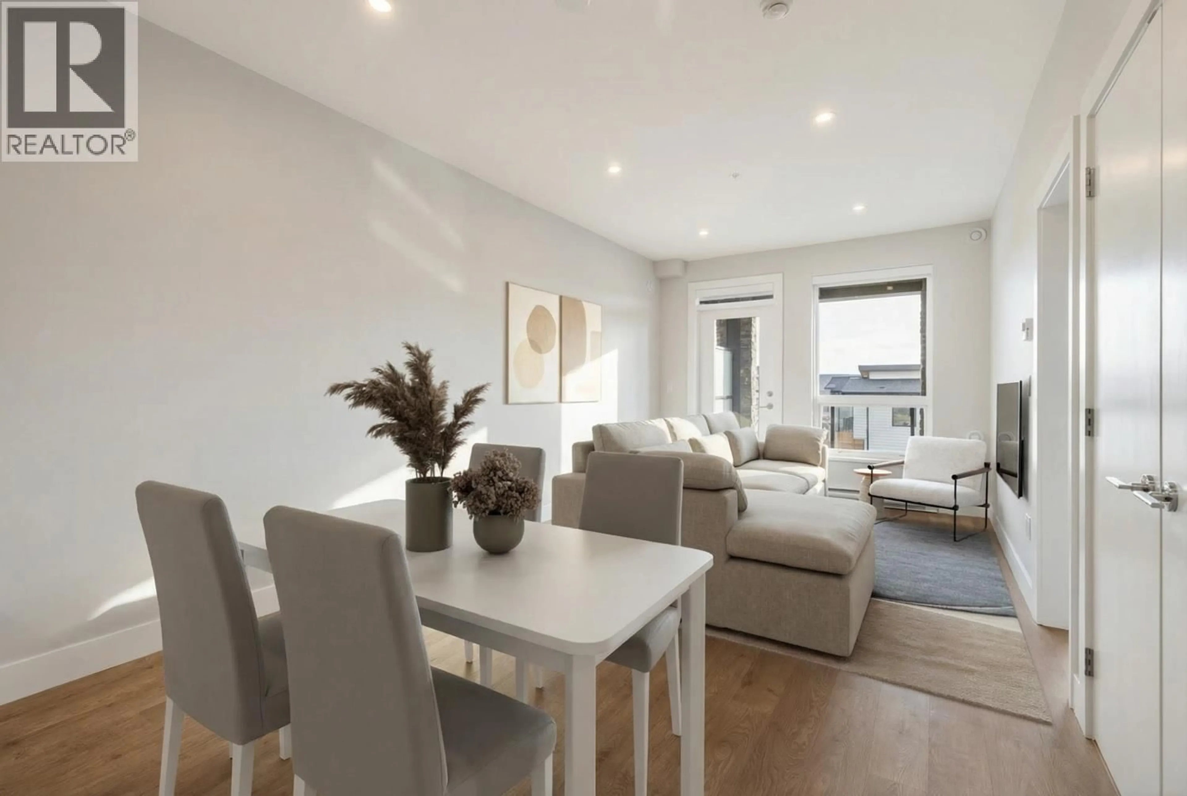 Living room with furniture, wood/laminate floor for 210 - 1930 STARLING DRIVE, Tsawwassen British Columbia V4M0H1