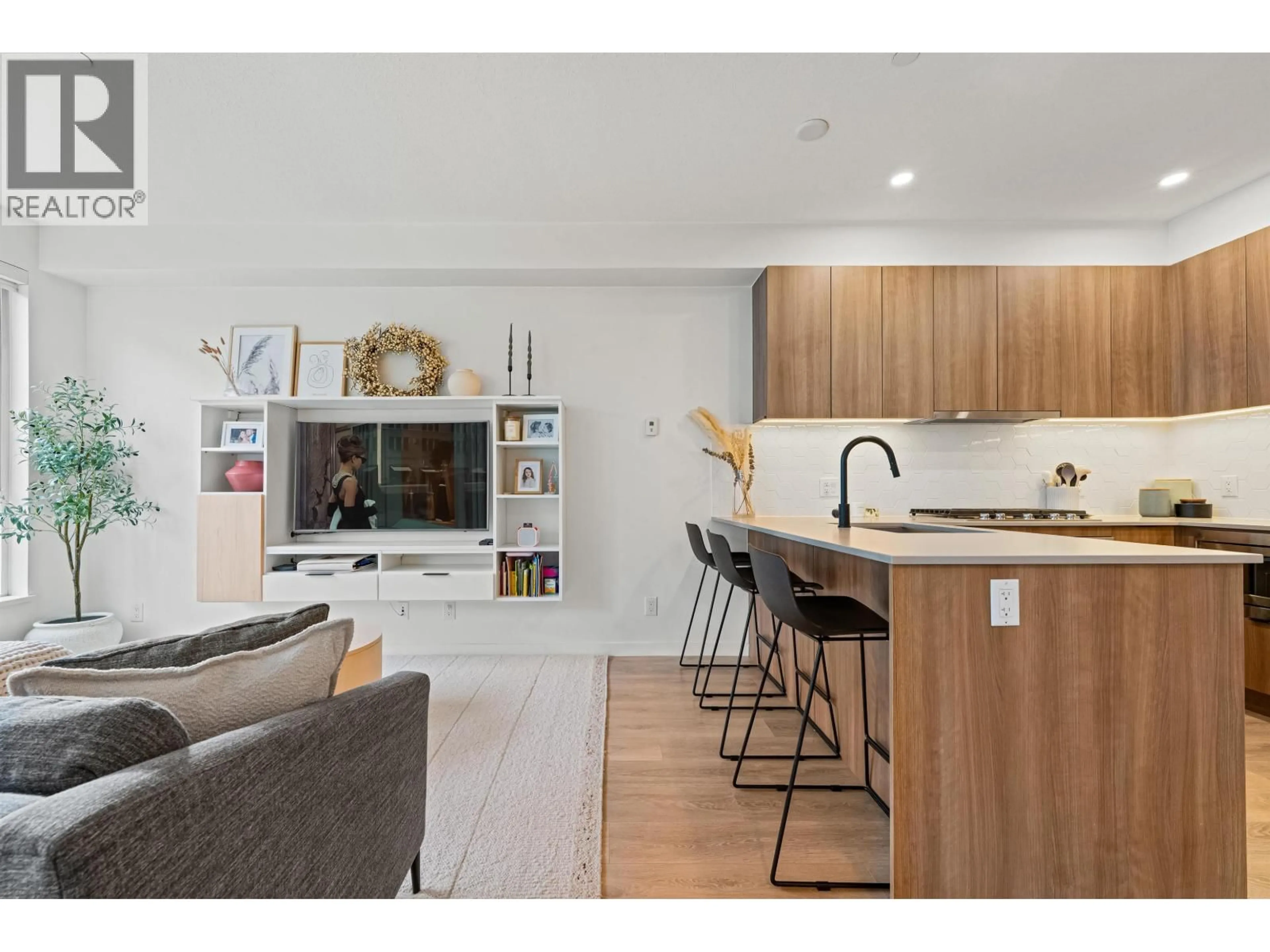 Open concept kitchen, wood/laminate floor for 7 - 533 3RD STREET, North Vancouver British Columbia V7L1G4