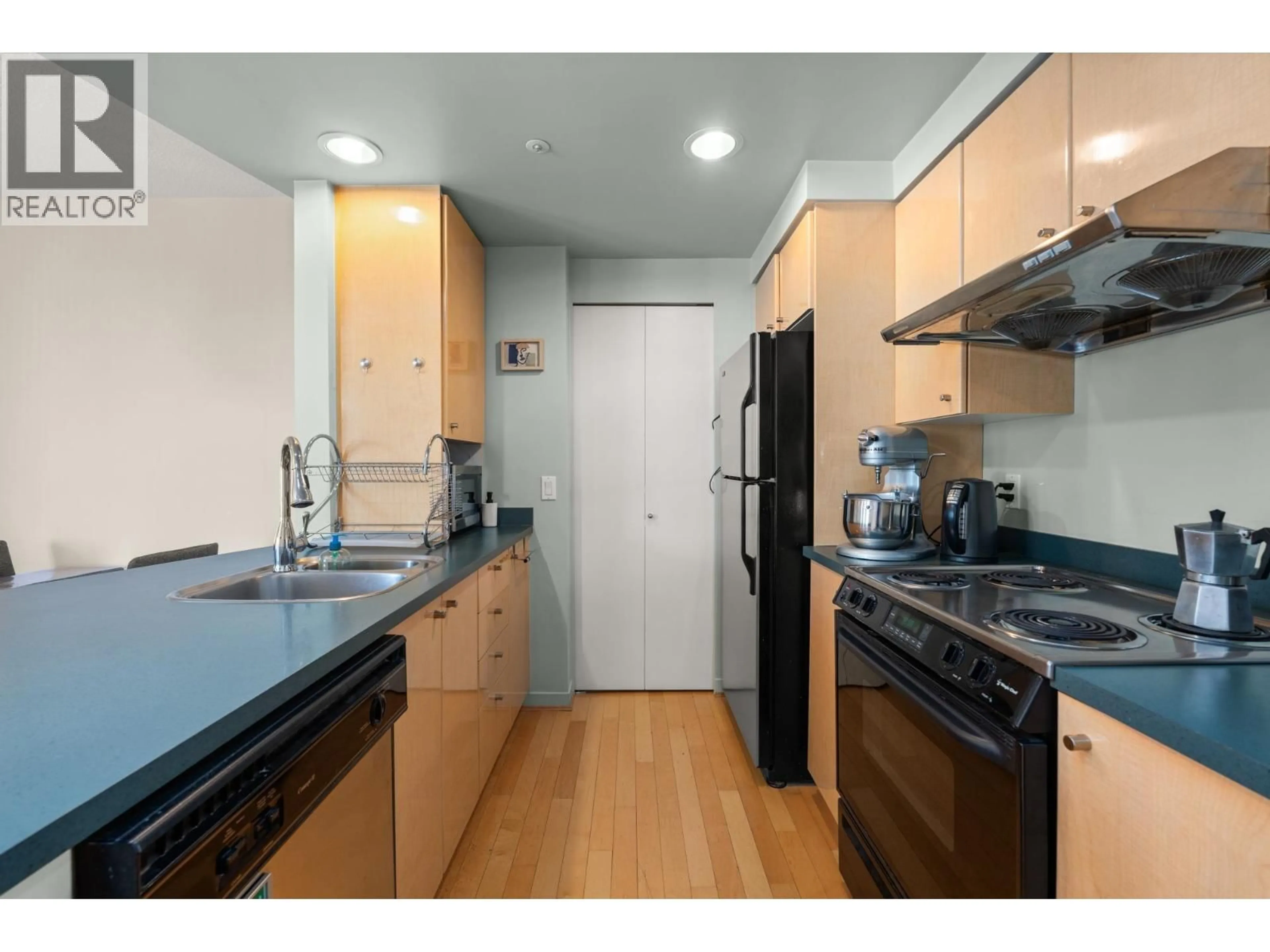 Standard kitchen, wood/laminate floor for 2601 - 1009 EXPO BOULEVARD, Vancouver British Columbia V6Z2V9