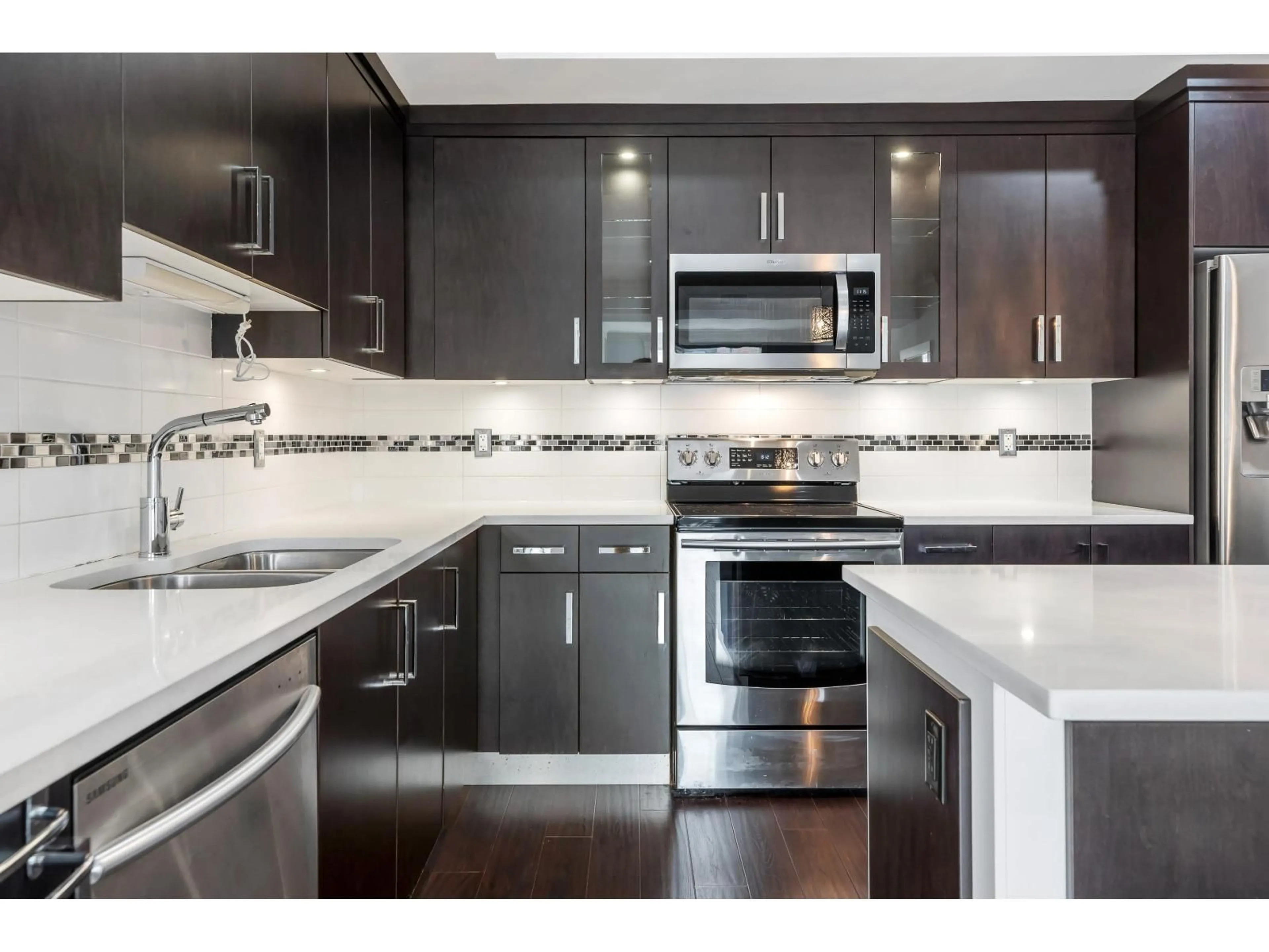 Open concept kitchen, ceramic/tile floor for 302 - 14885 60 AVENUE, Surrey British Columbia V3S1R8