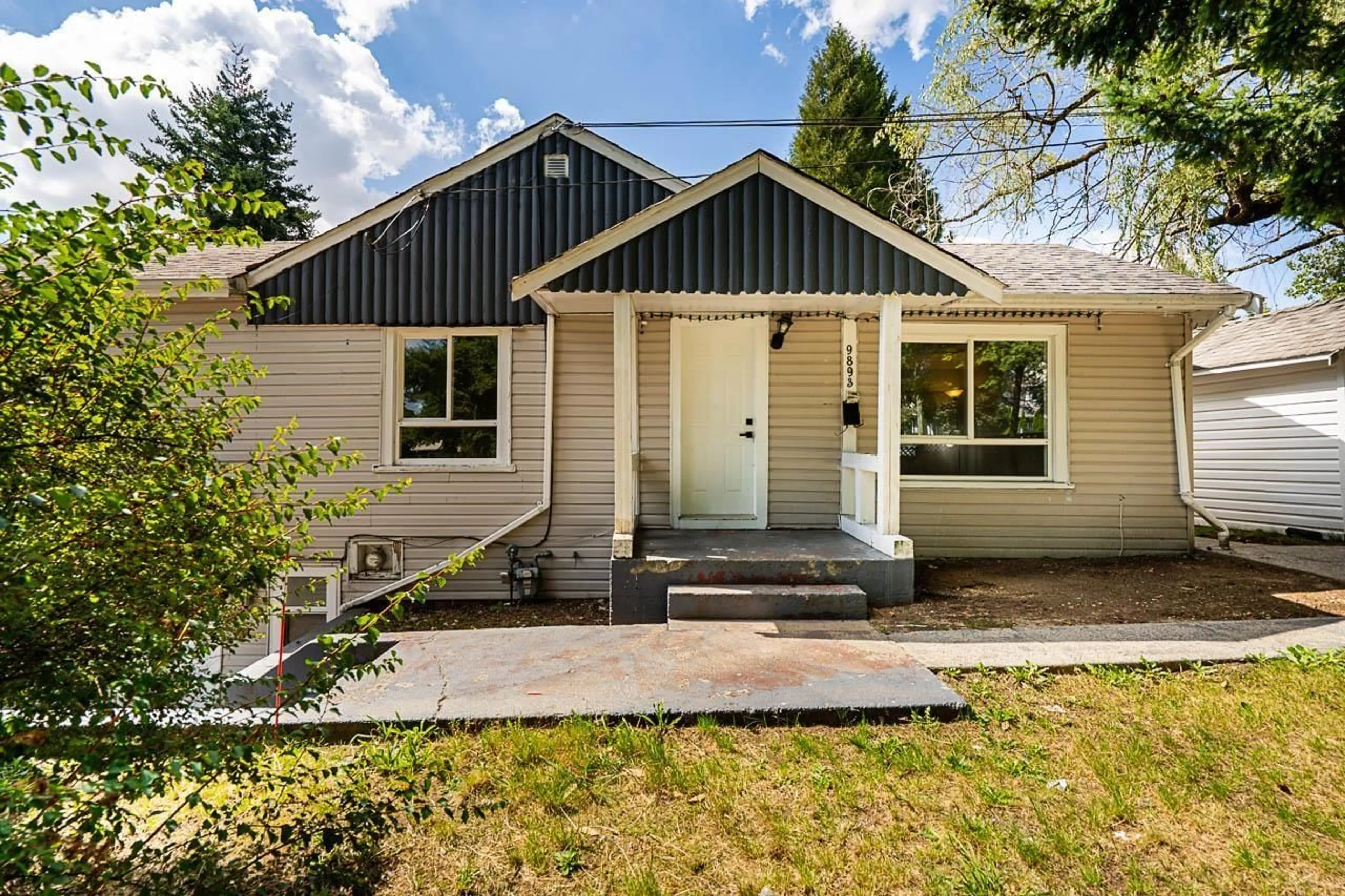 Home with vinyl exterior material, street for 9893 132 STREET, Surrey British Columbia V3T3S7