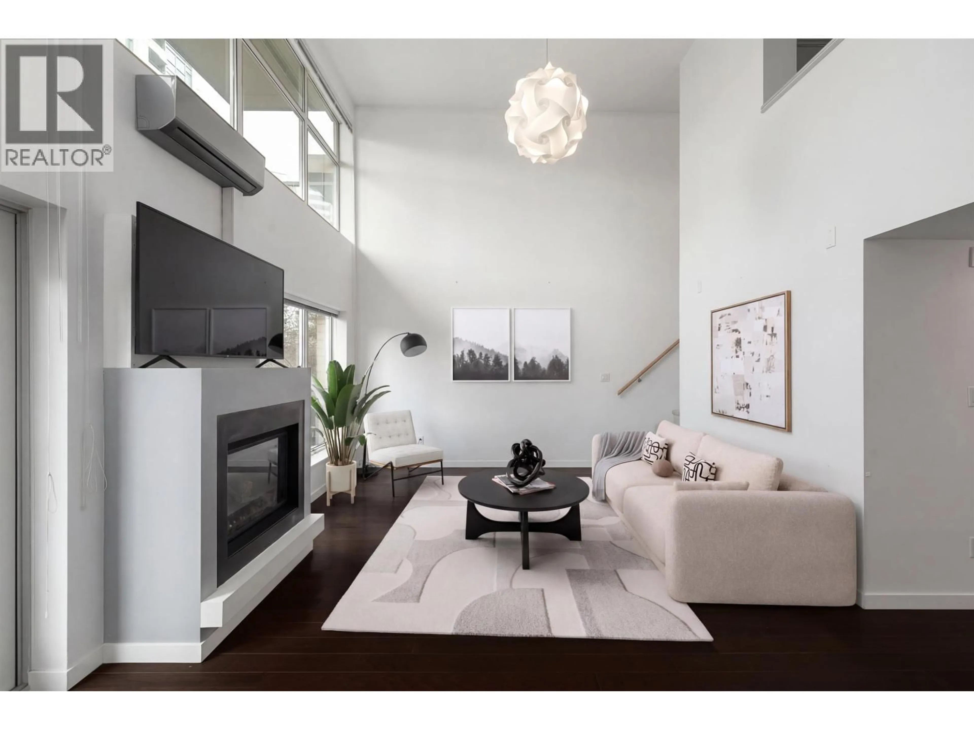 Living room with furniture, wood/laminate floor for PH7 - 1288 CHESTERFIELD AVENUE, North Vancouver British Columbia V7M0B1