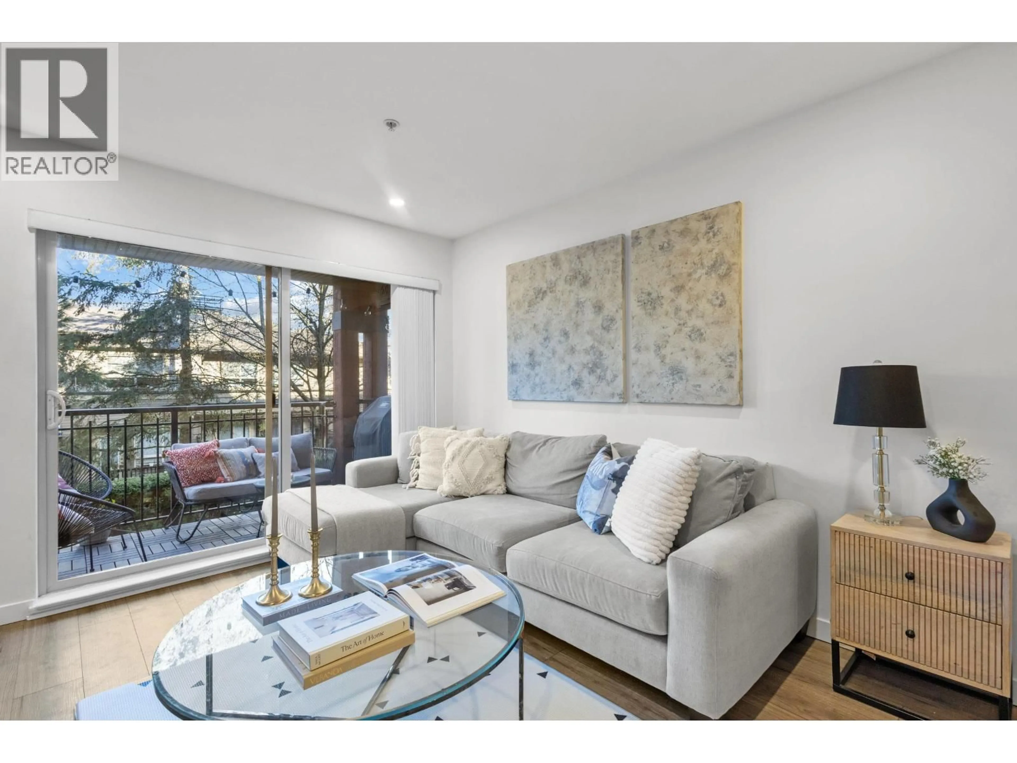 Living room with furniture, unknown for 201 - 200 KLAHANIE DRIVE, Port Moody British Columbia V3H5K7