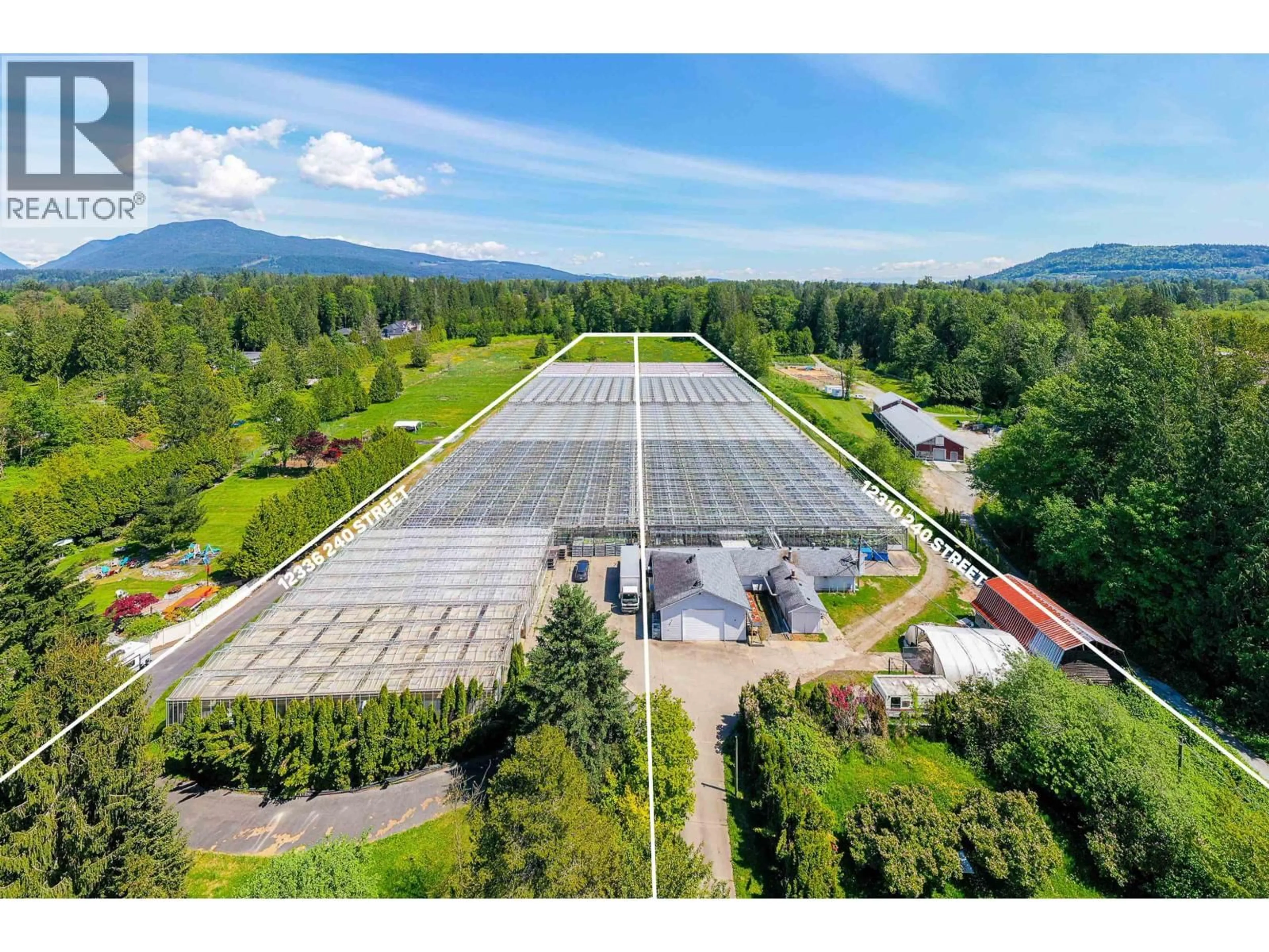 A pic from outside/outdoor area/front of a property/back of a property/a pic from drone, mountain view for 12336 240 STREET, Maple Ridge British Columbia V4R1N1